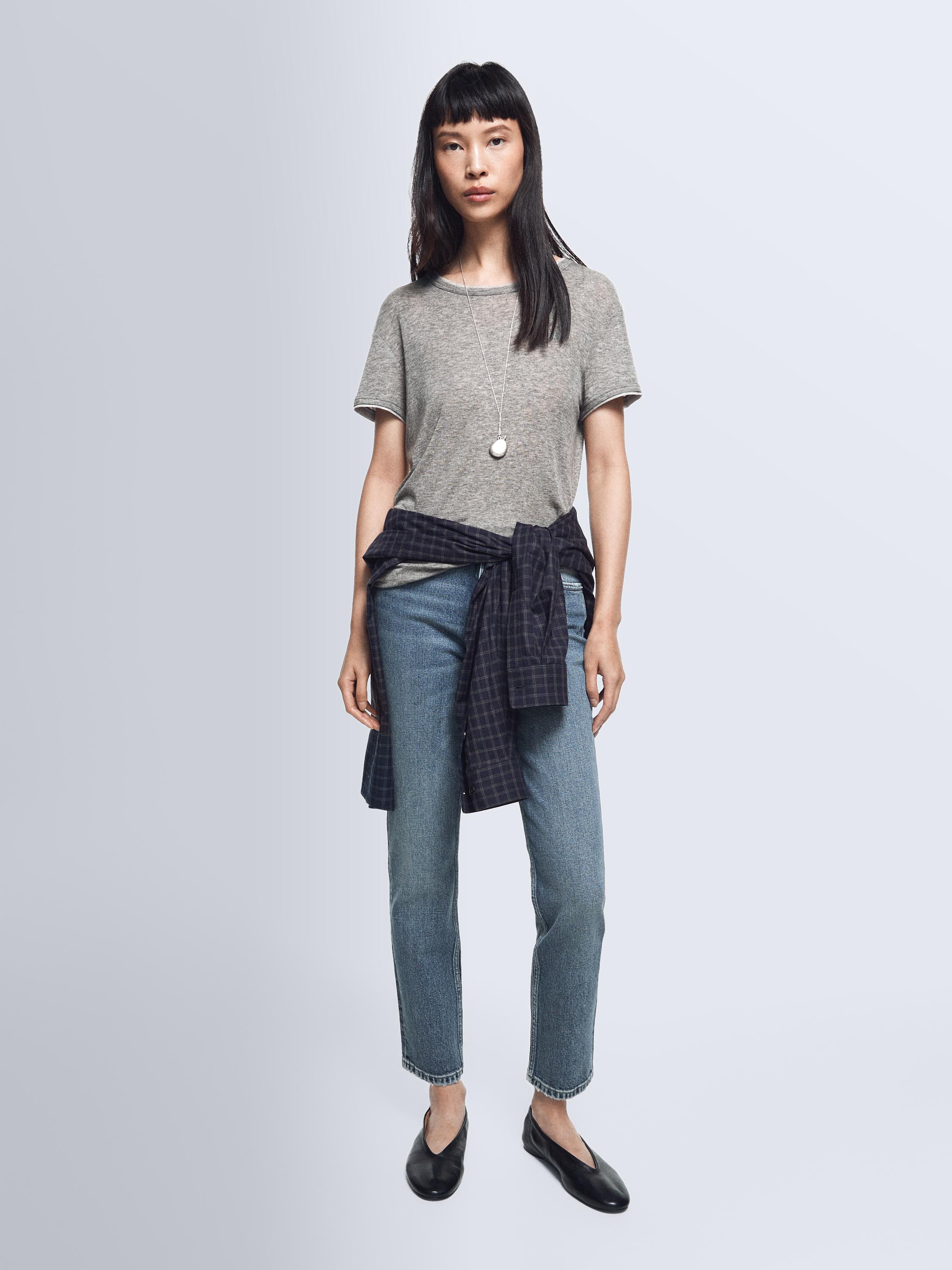 Jeans slim fit cropped tiro medio