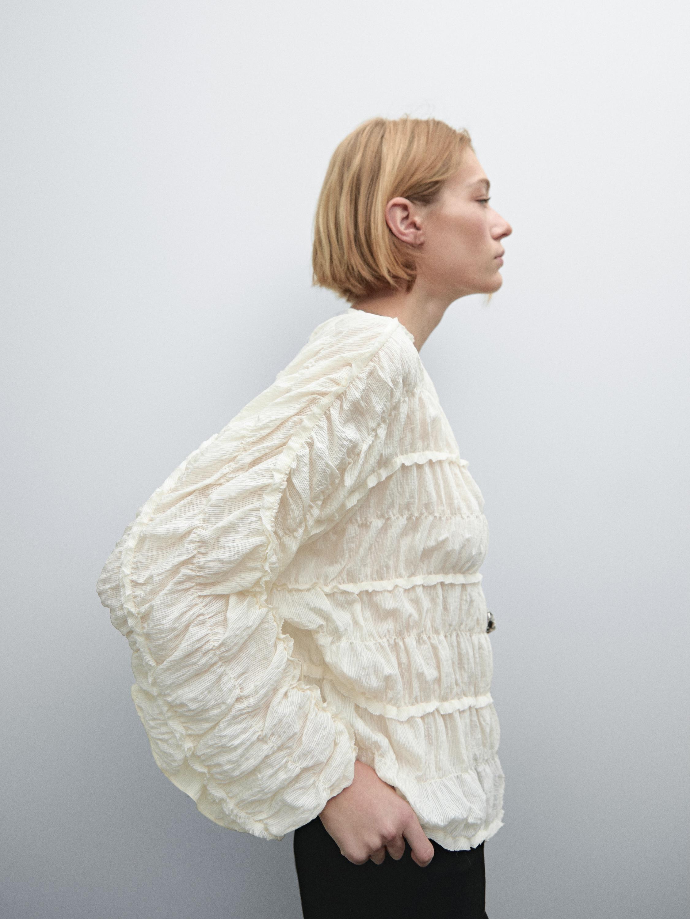 Flowing blouse with gathered detail
