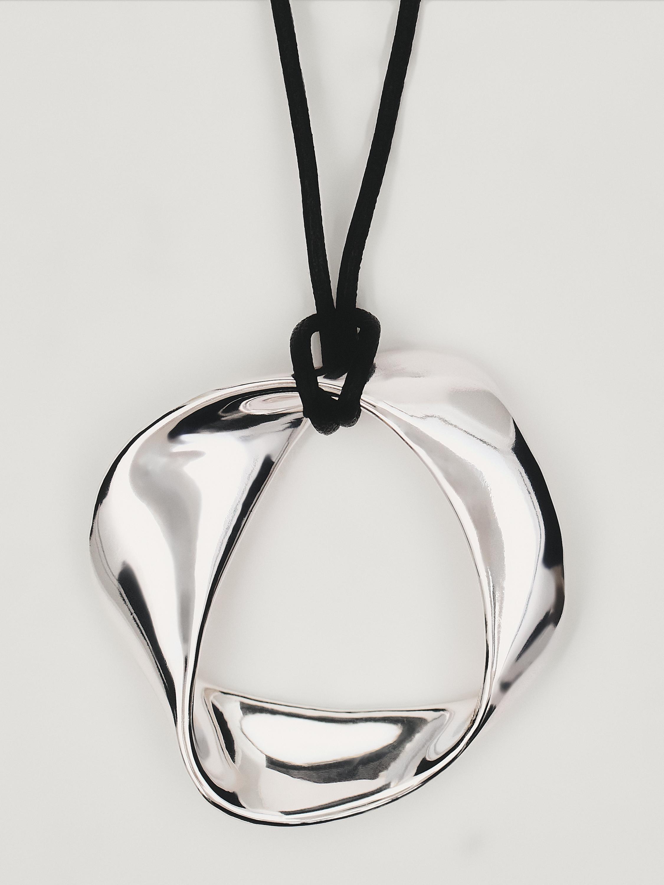 Leather cord necklace with asymmetric piece