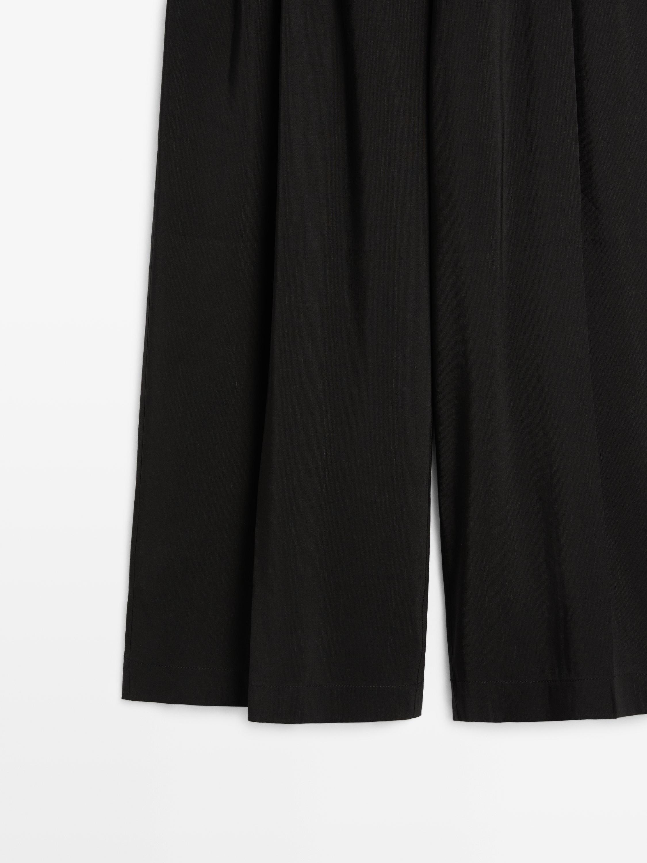 Keten karışımlı dökümlü pantolon