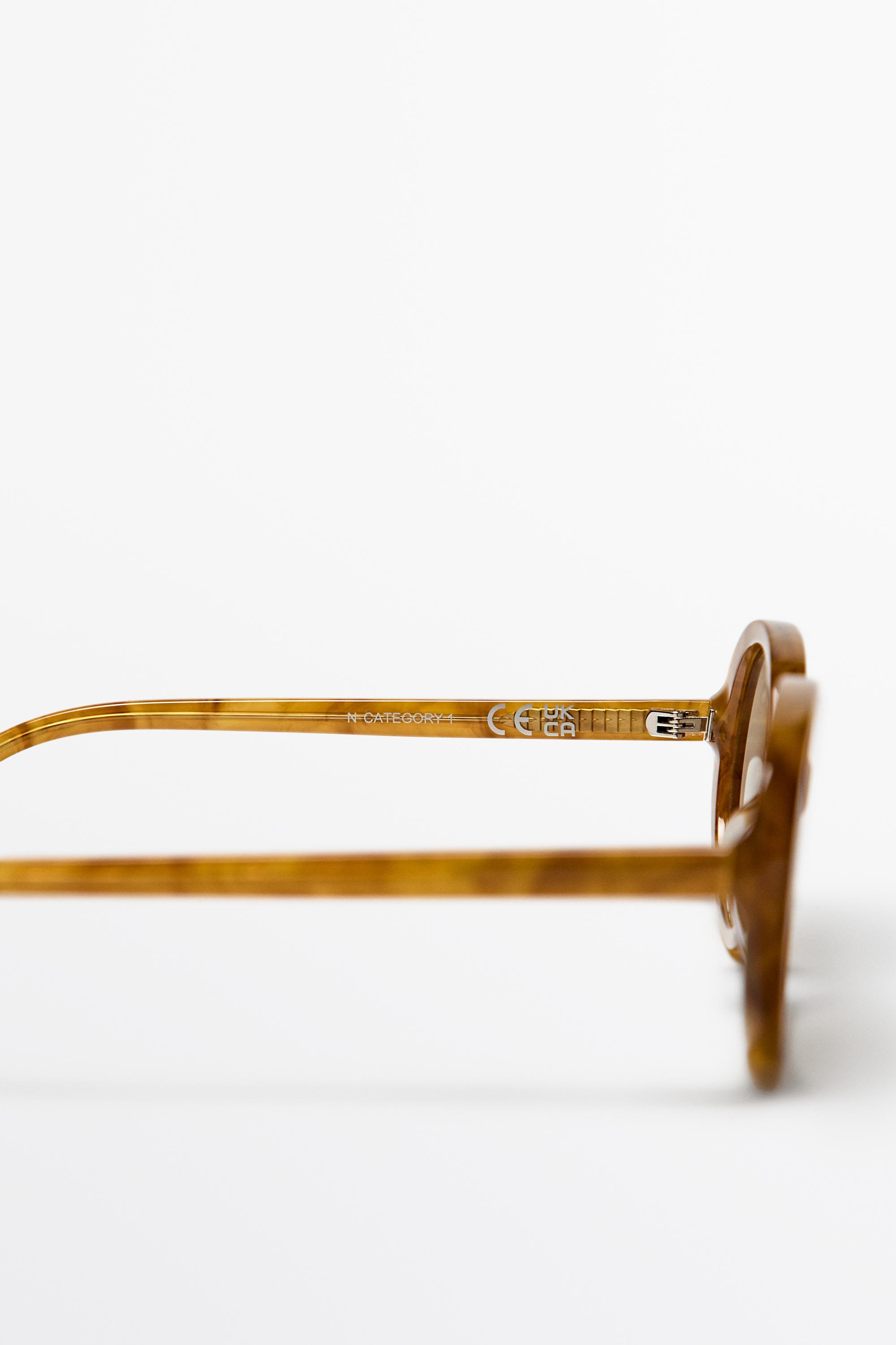 Oval sunglasses — Caramel