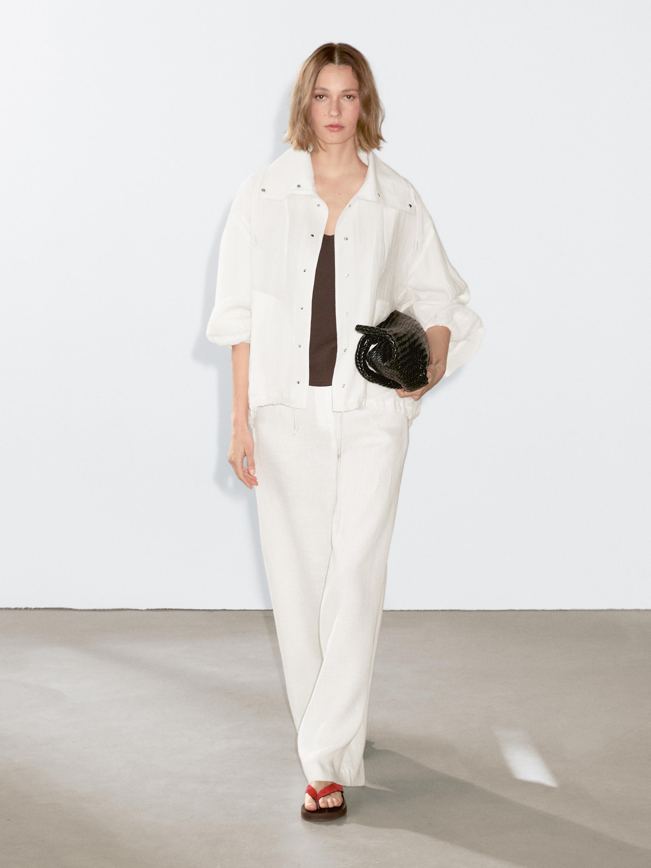 Flowing bomber jacket with voluminous detail