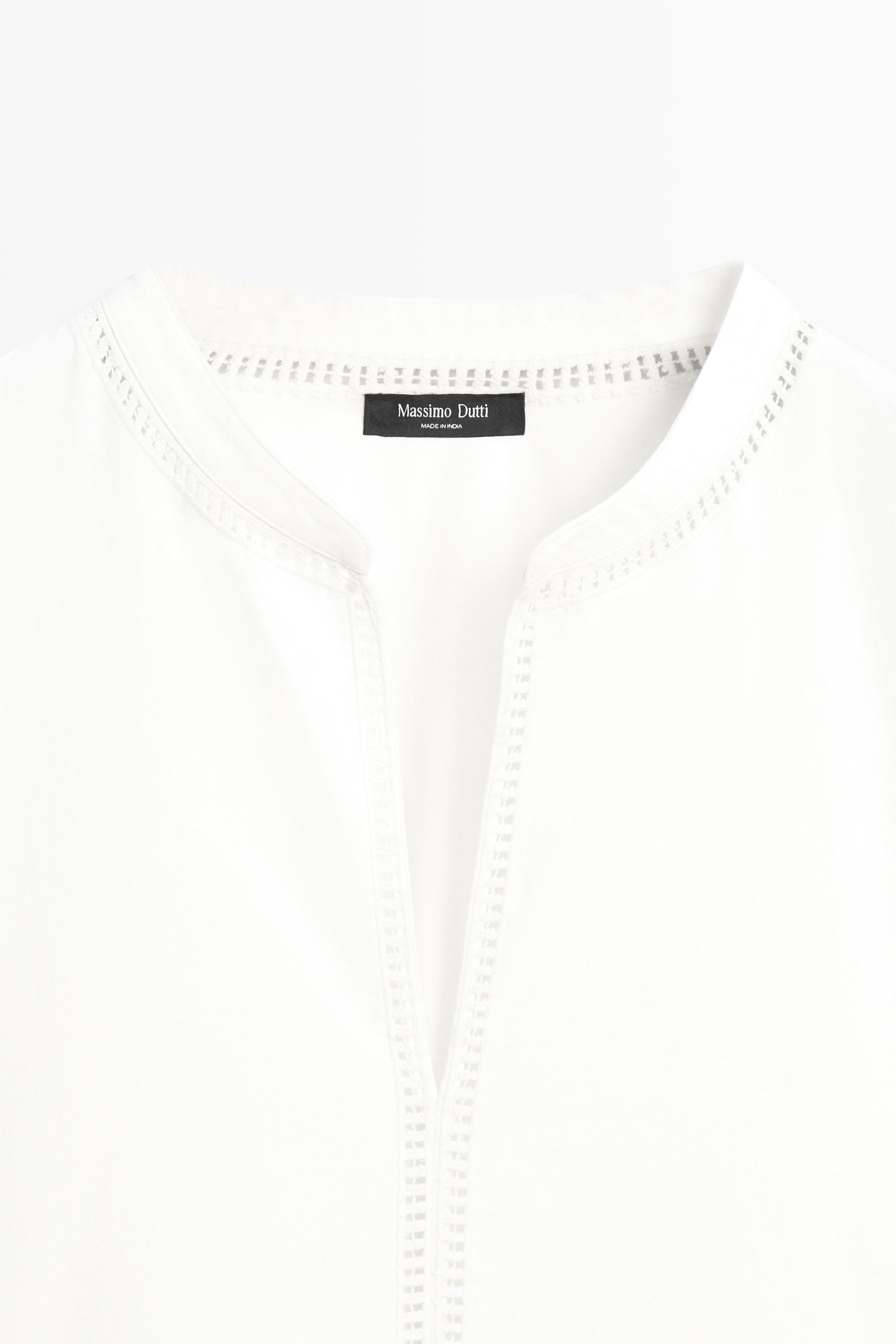 Embroidered blouse with fringed hem — WHITE