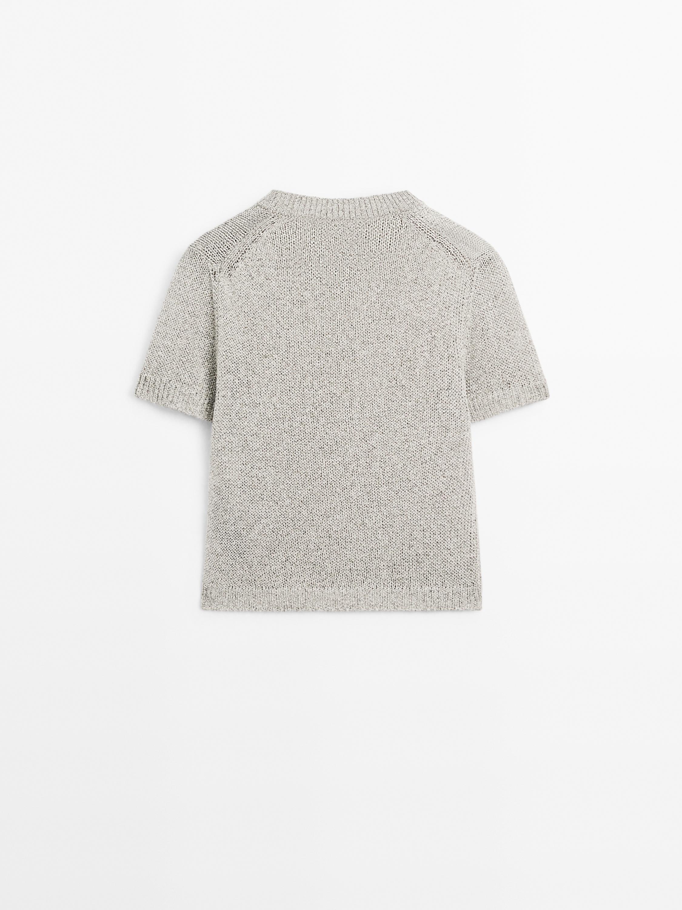 Knit sweater with fabric detail