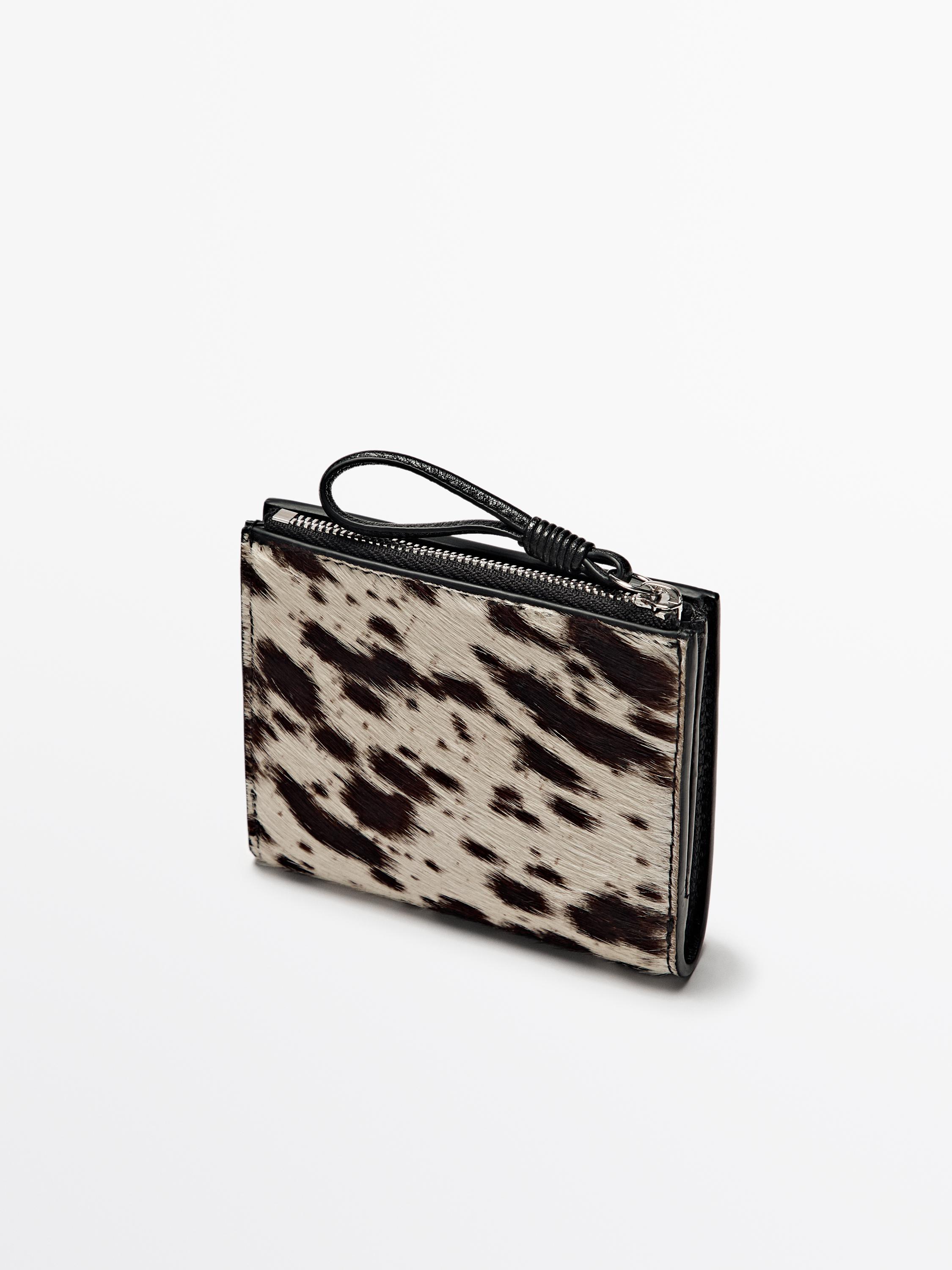 Cartera estampat animal pell