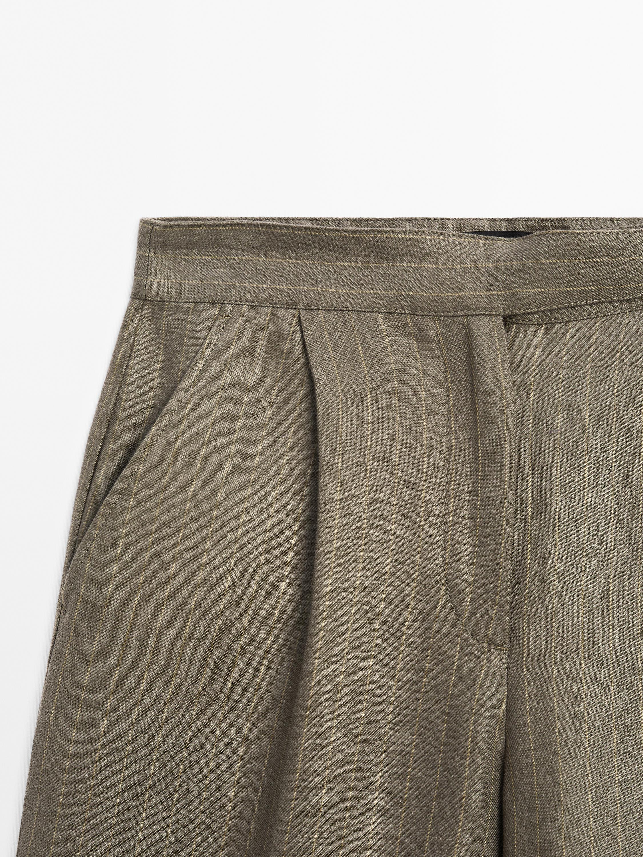 100% linen striped trousers with buckle detail