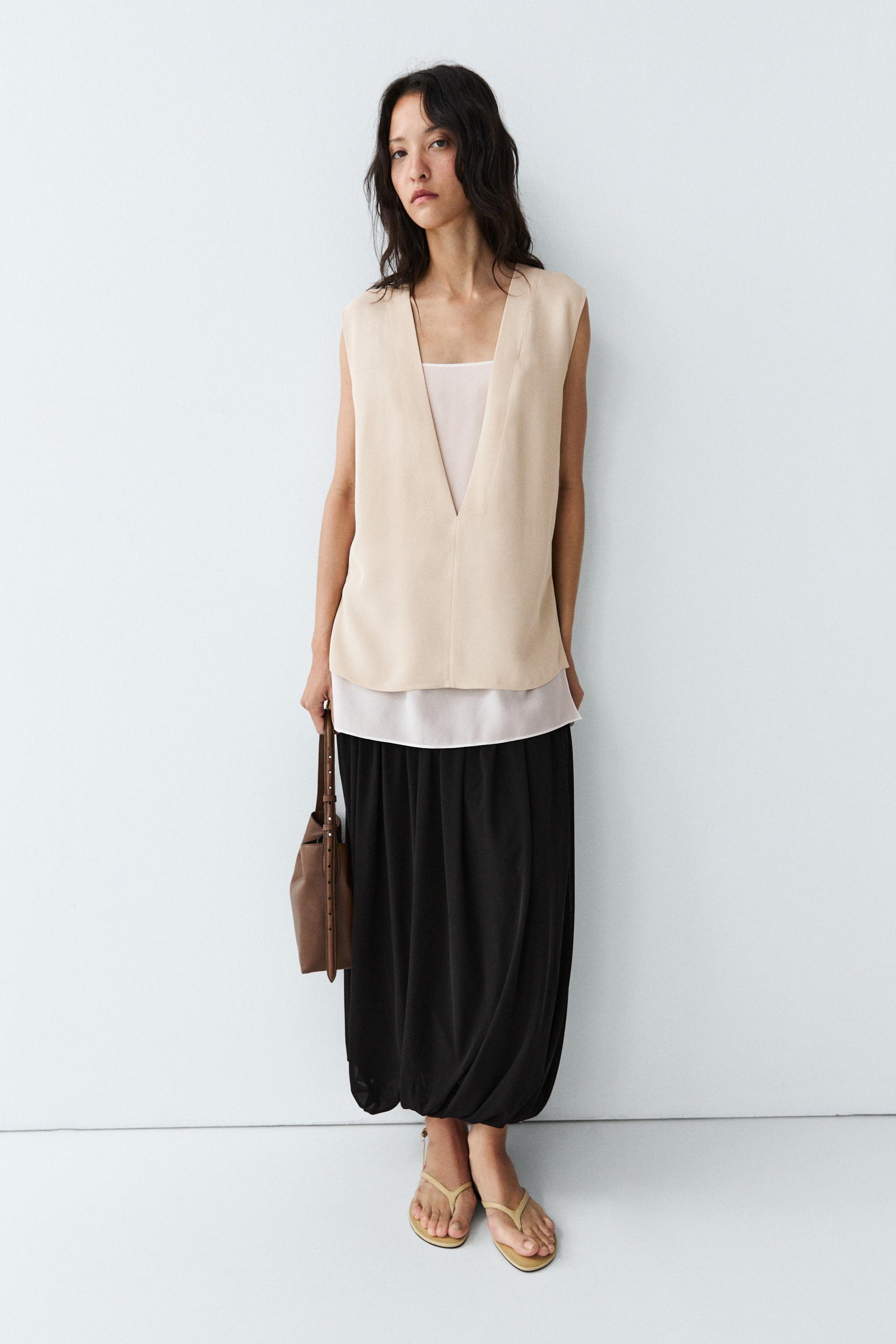 Flowing double-layer top with contrast detail — CREAM