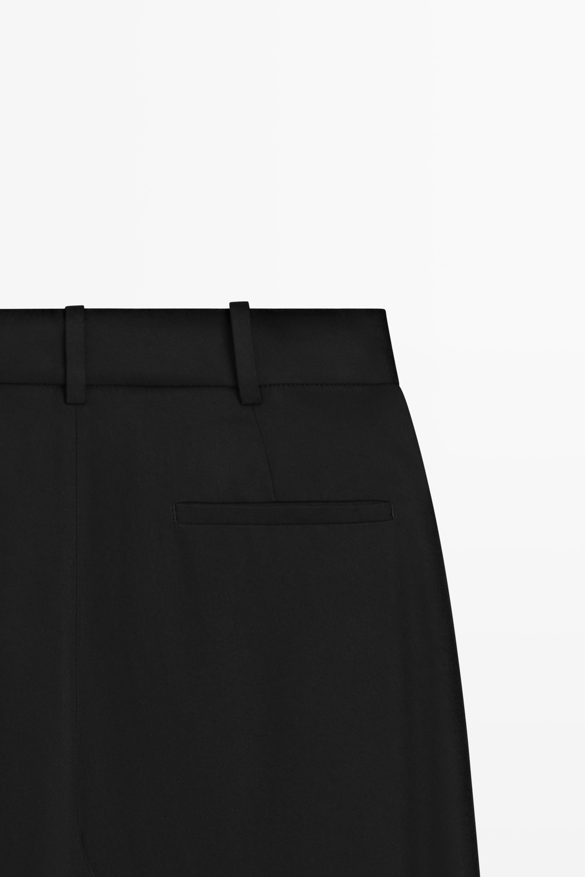 Flowing pleated pants with button detail — BLACK