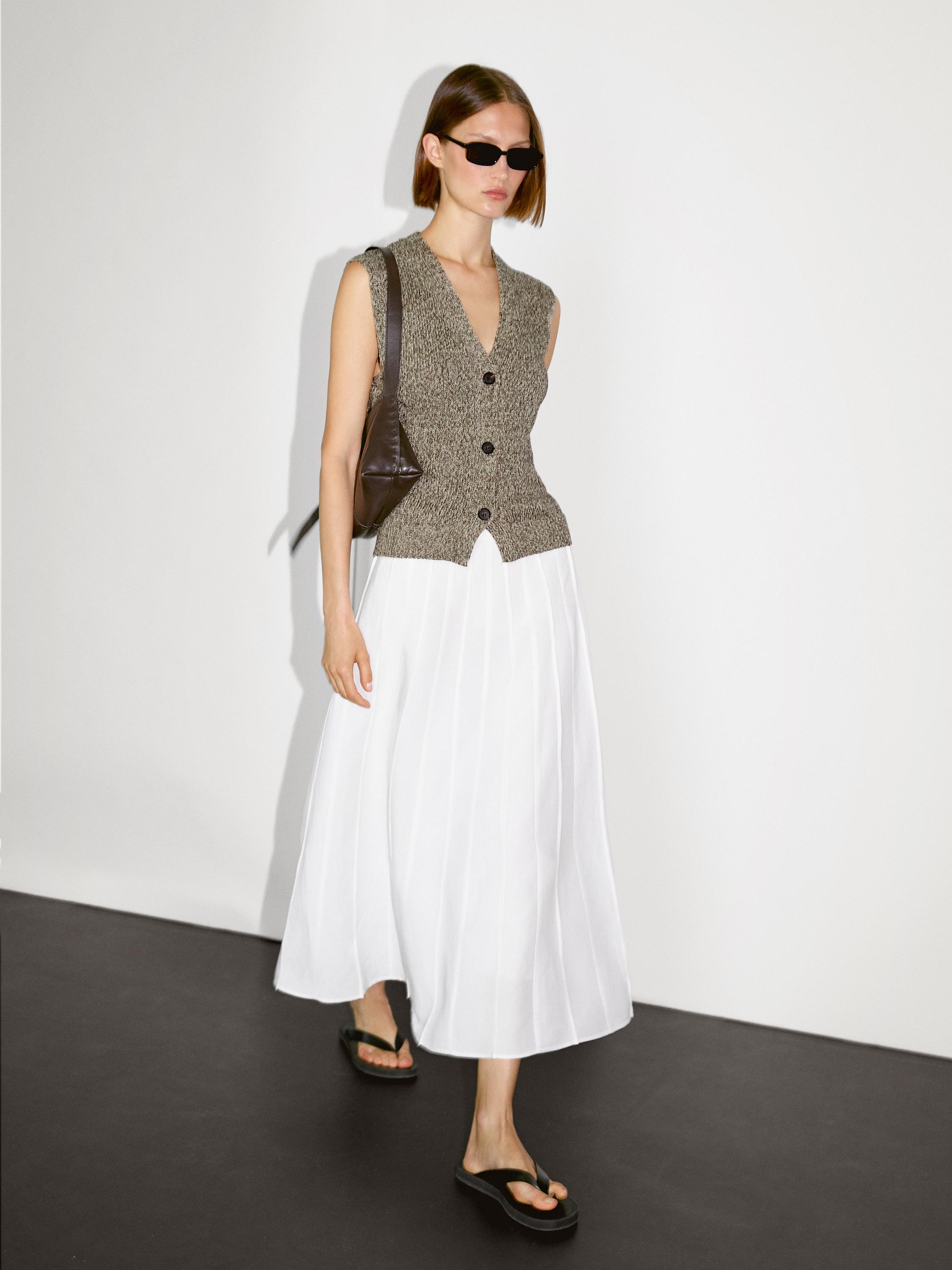 Veste sans manches en maille moulinée à col en V