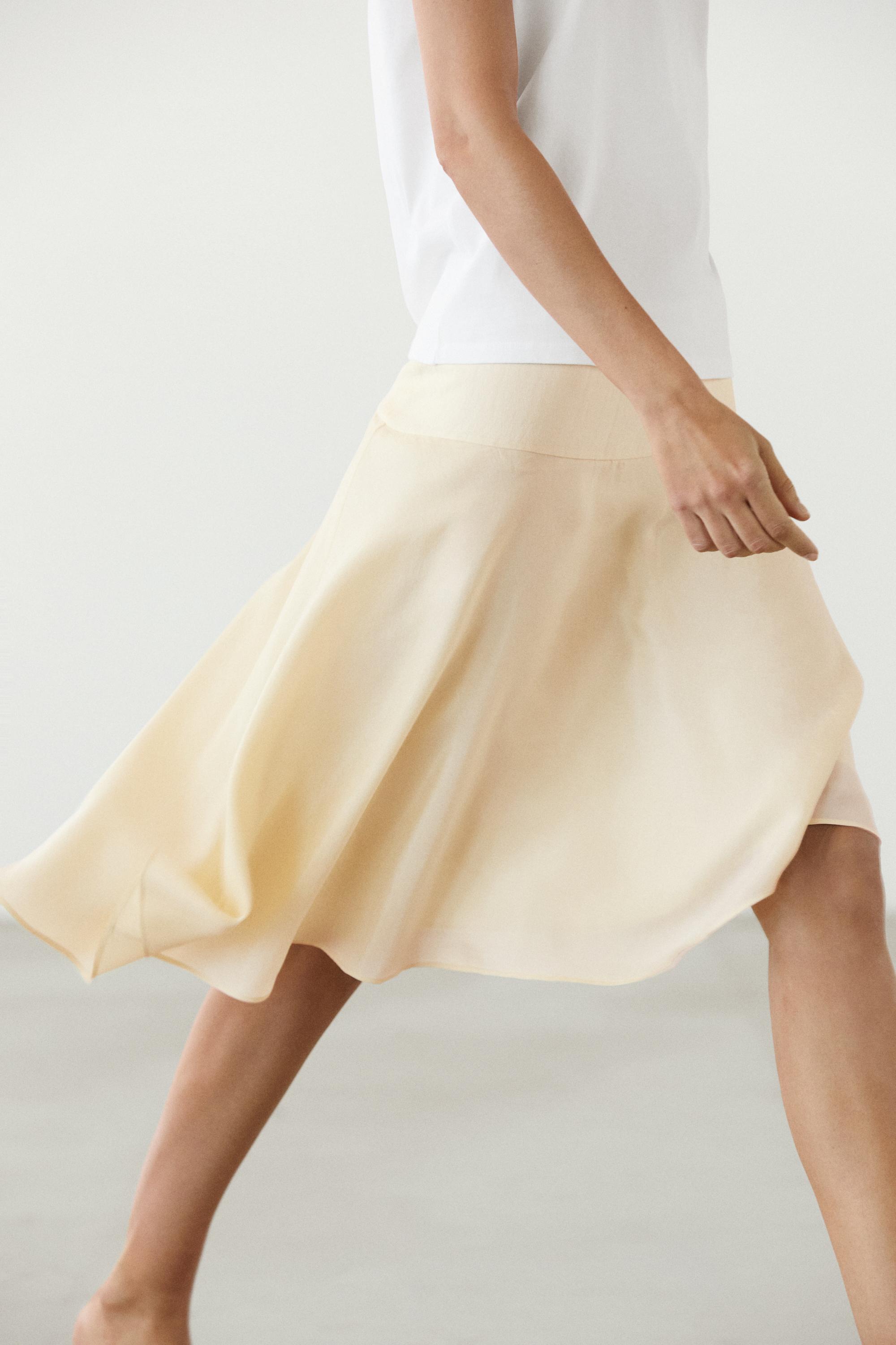 Flowing asymmetric midi skirt — Gold