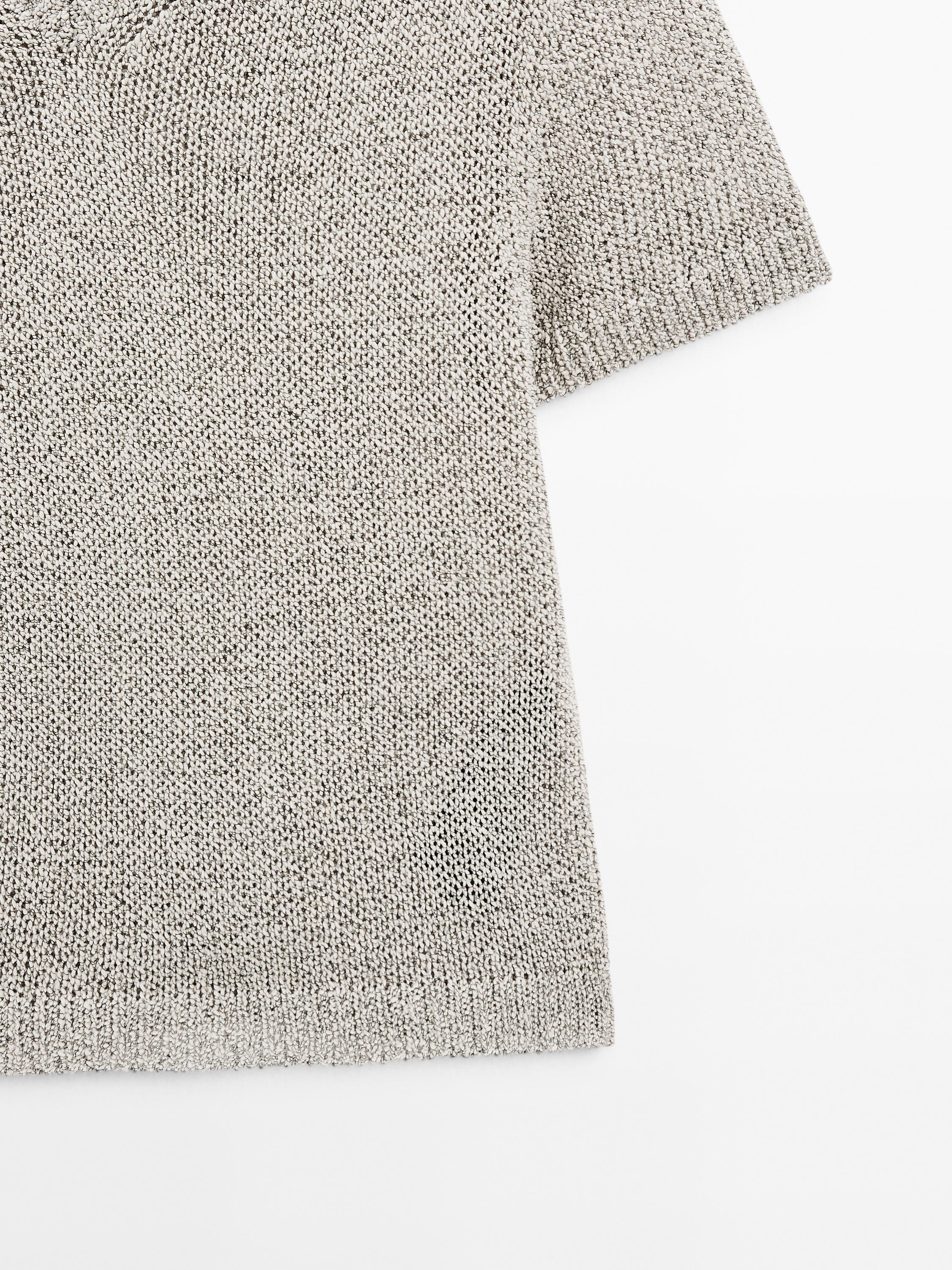 Knit sweater with fabric detail