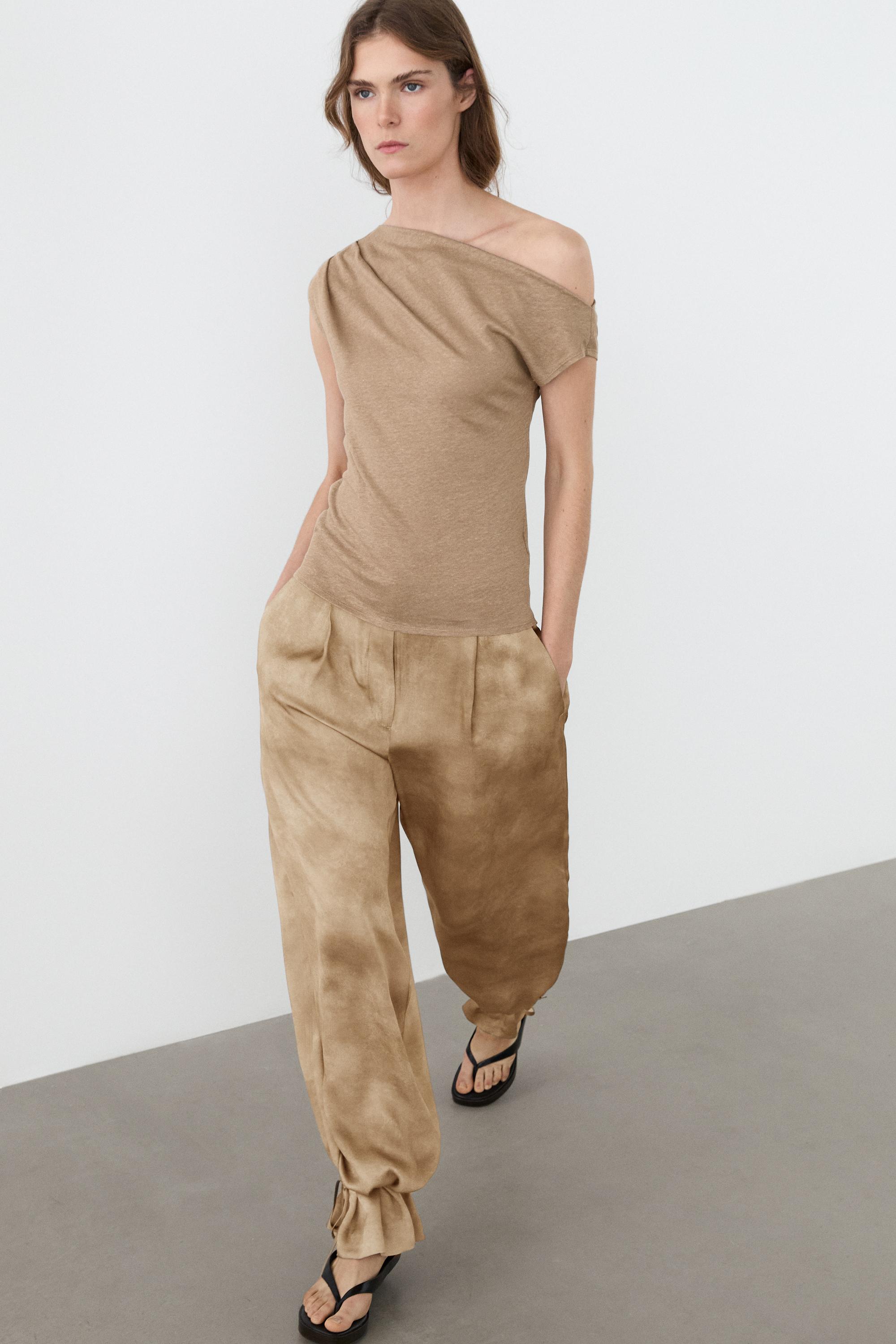 Asymmetric linen blend top with draped detail — Washed