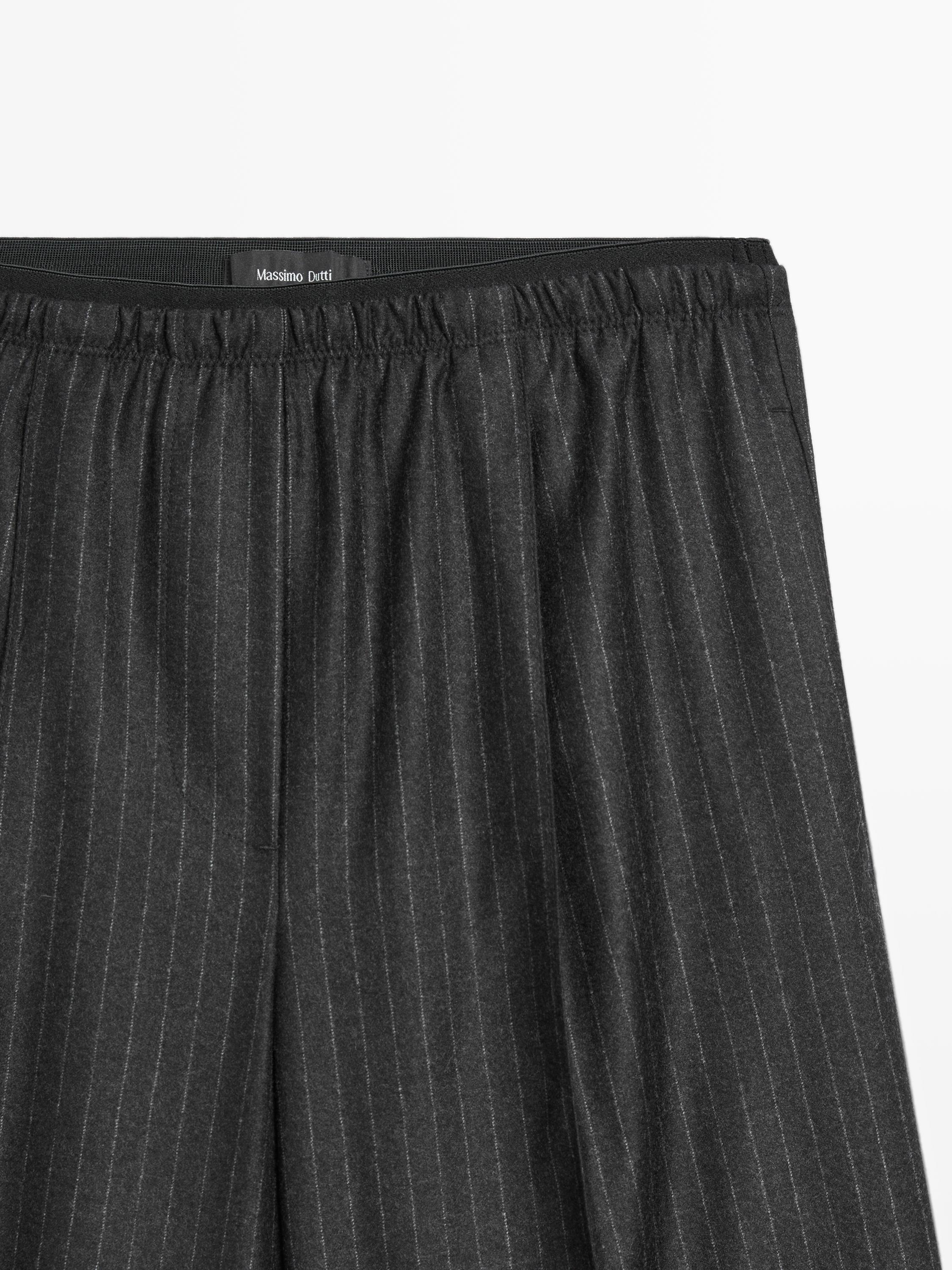 Joggingbroek met krijtstreep en bandplooi