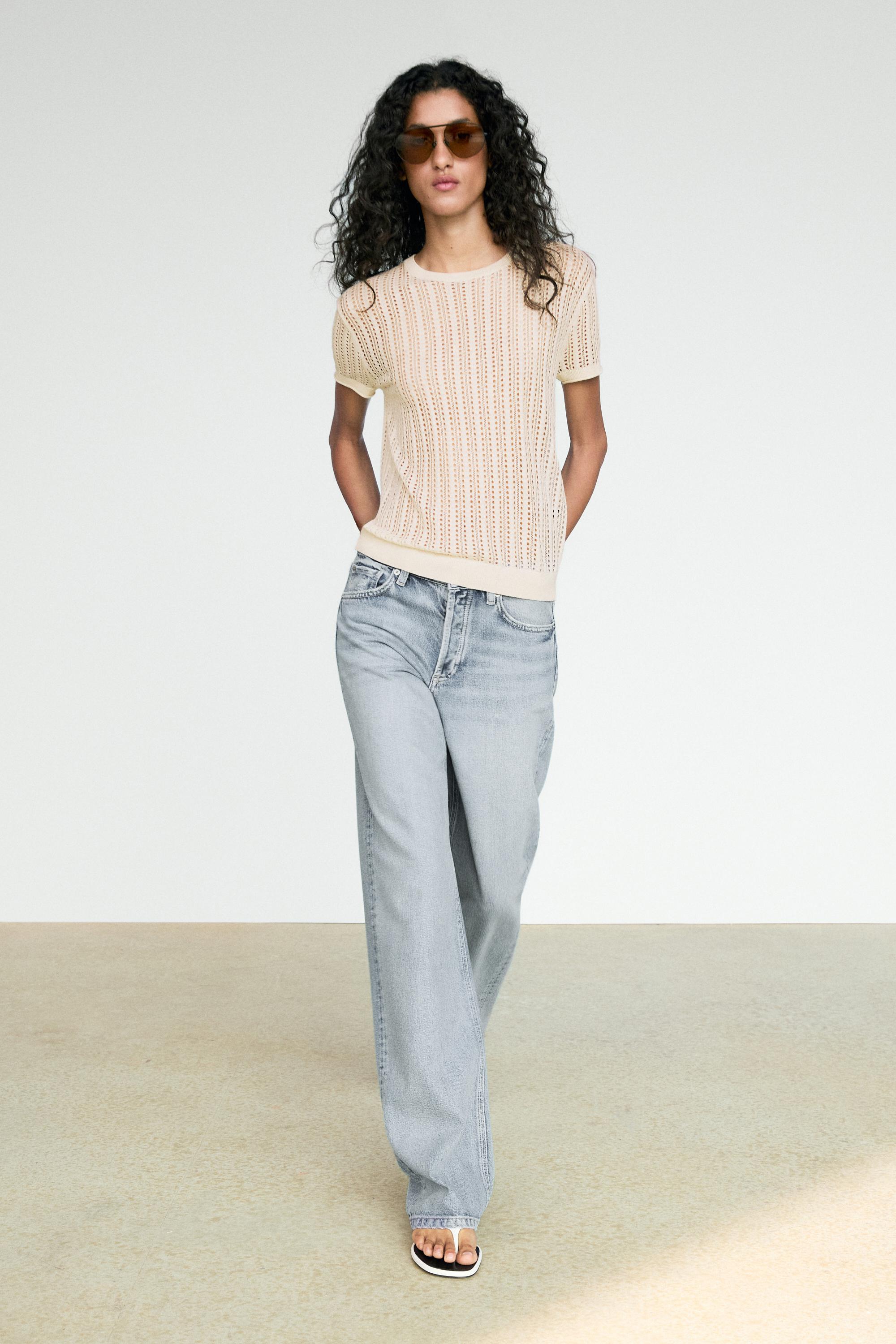 Short sleeve cutwork knit top
