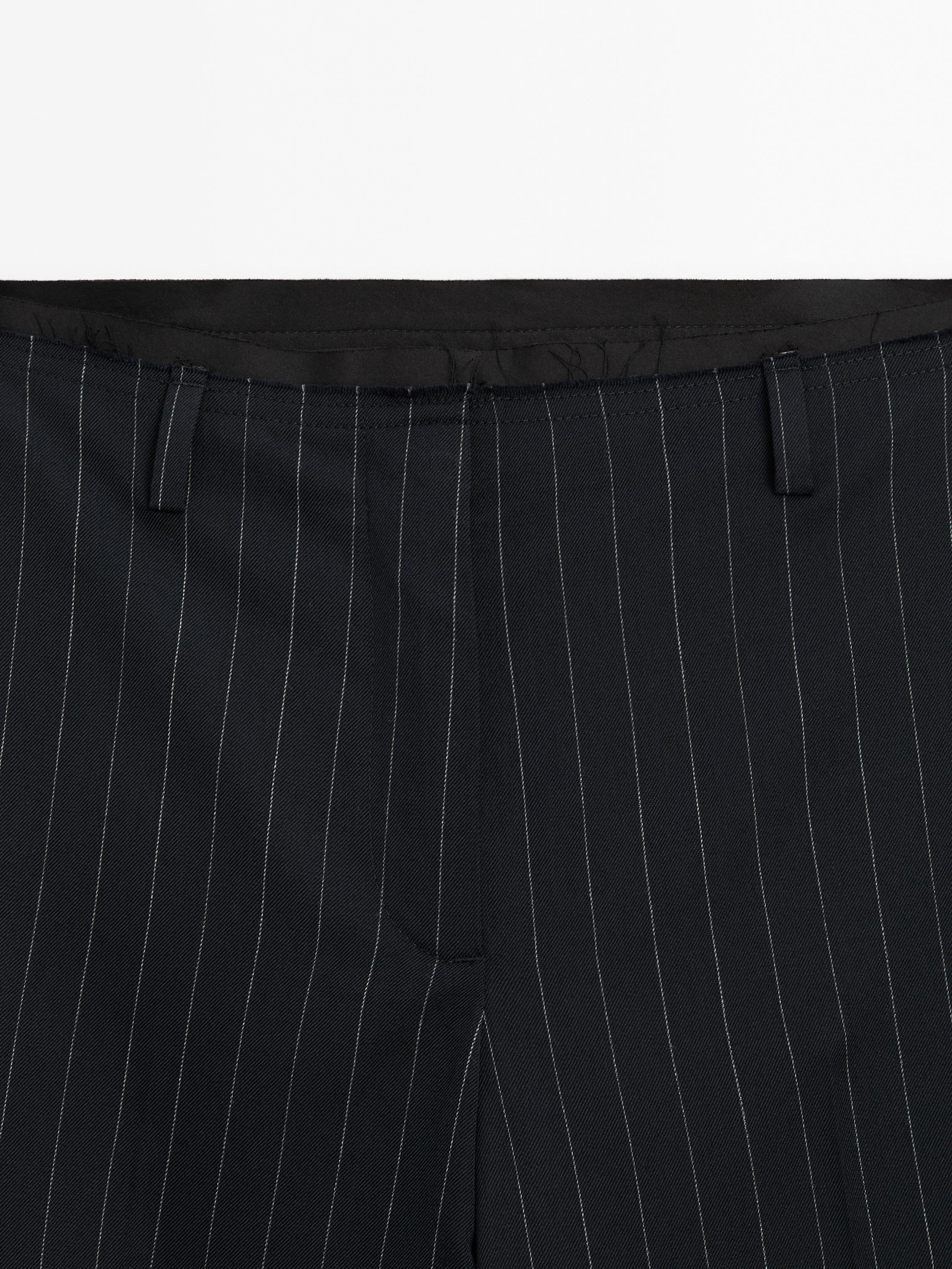 Pinstripe wool blend trousers
