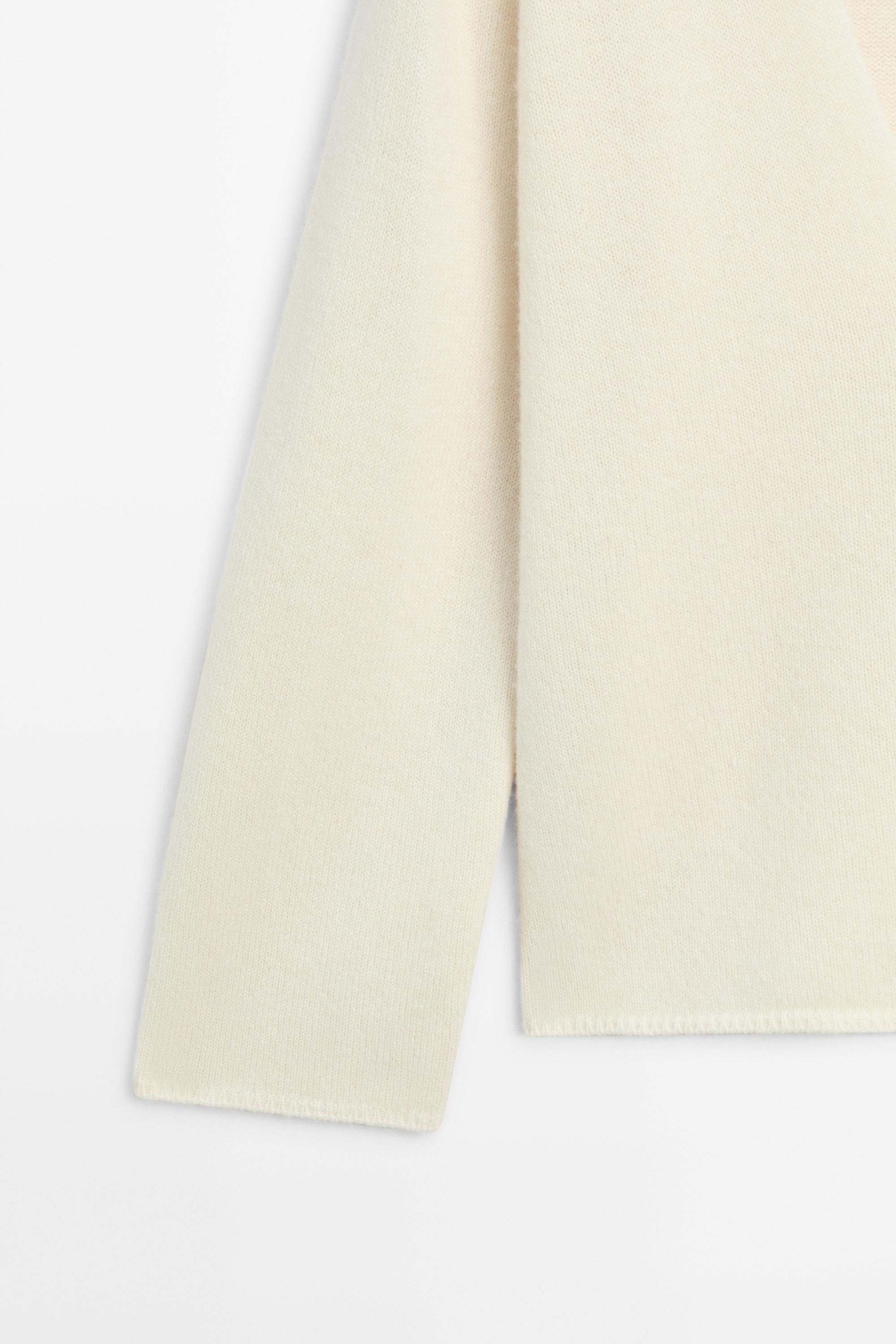 Long-line knit sweater with neckline detail — OCHRE MARL
