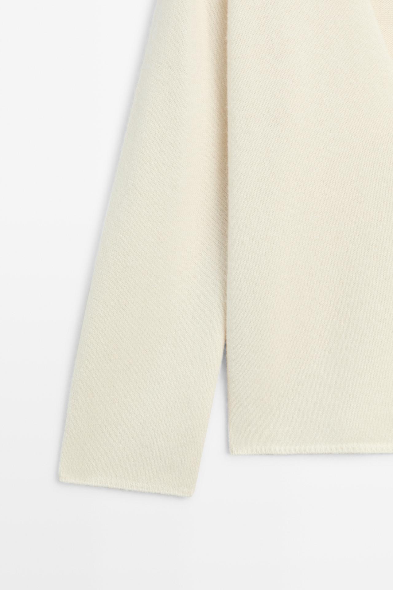 Long-line knit sweater with neckline detail — OCHRE MARL