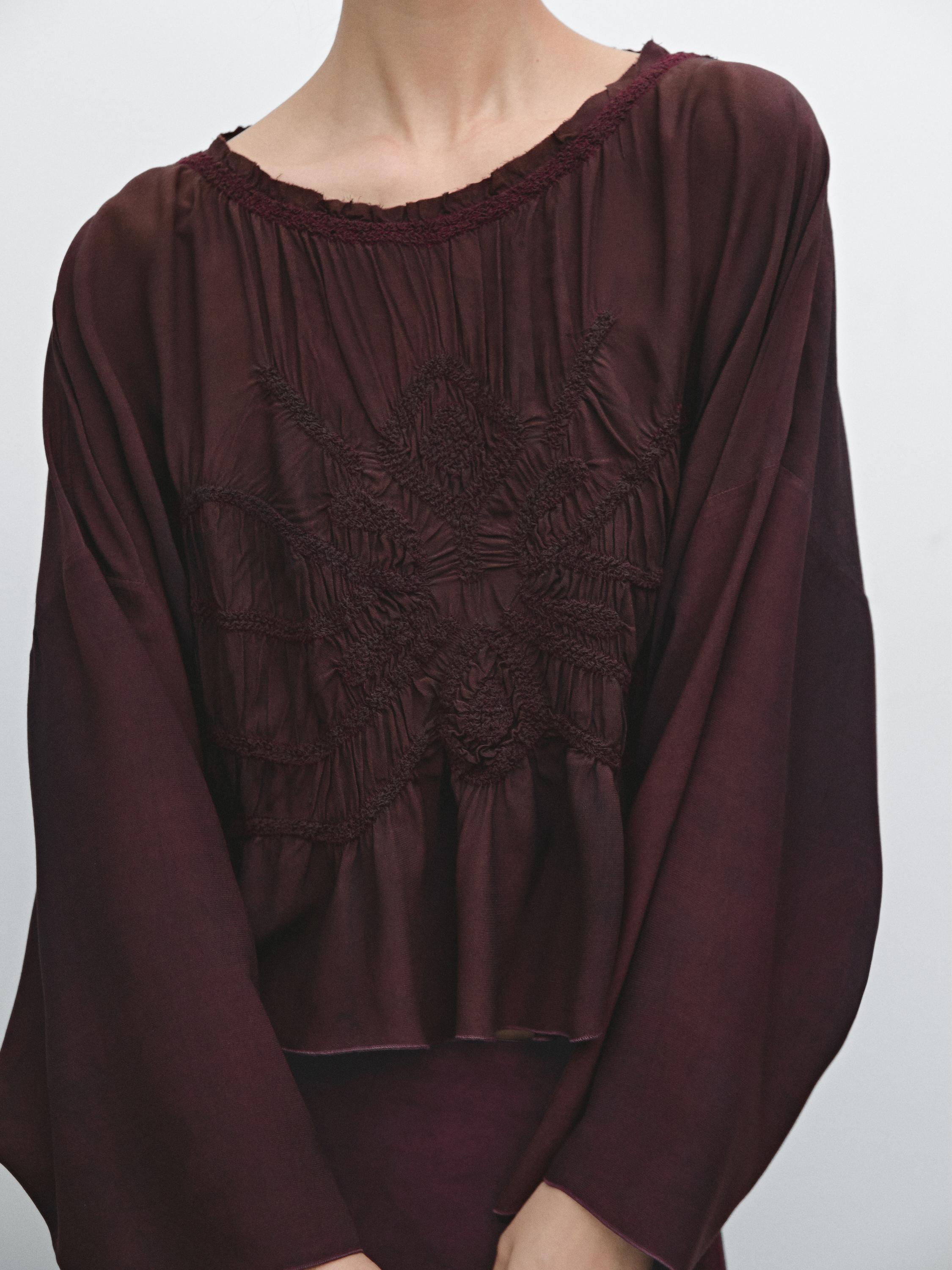 Flowing blouse with gathered detail