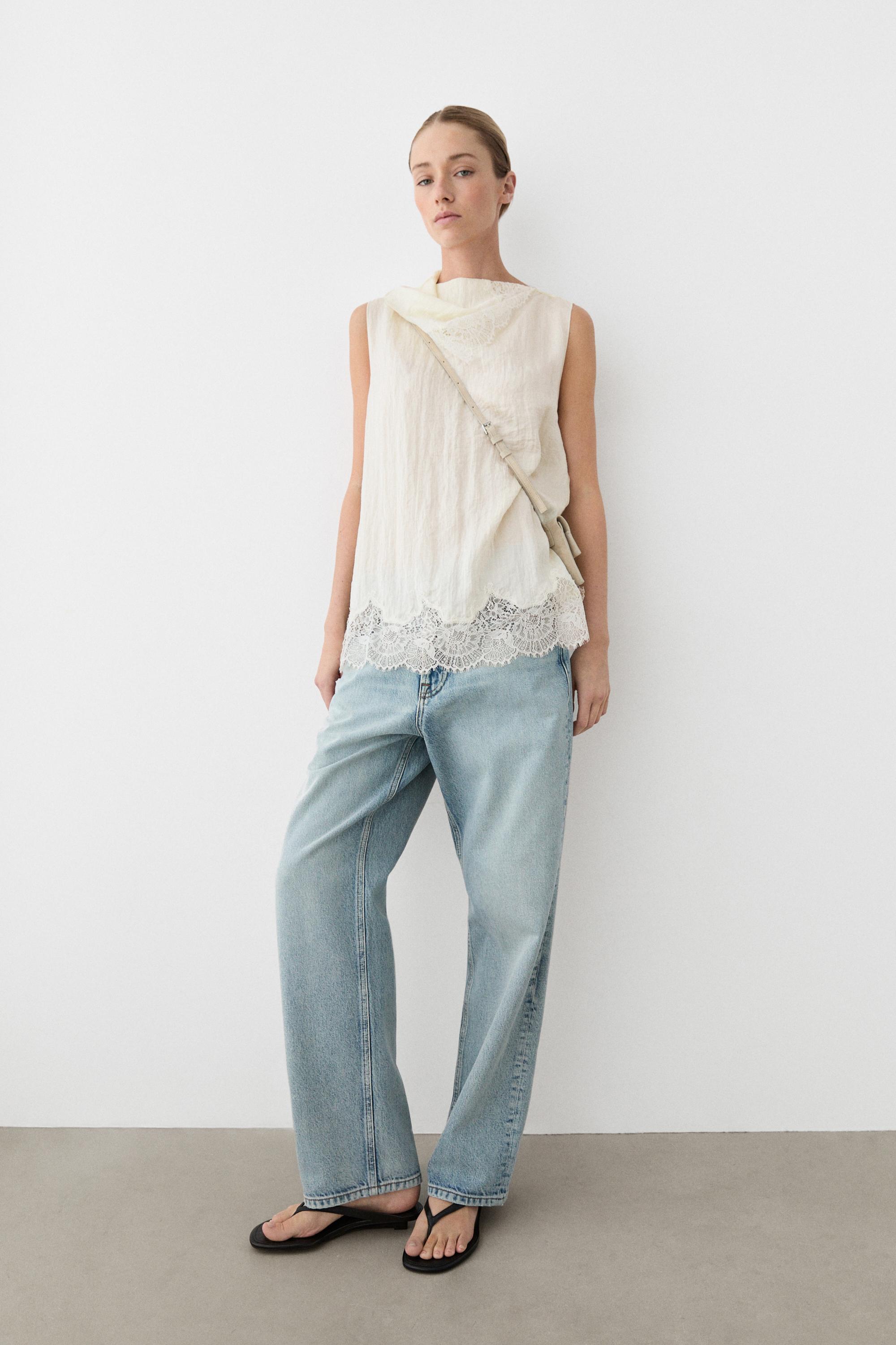 Asymmetric roll neck top with lace detail — CREAM