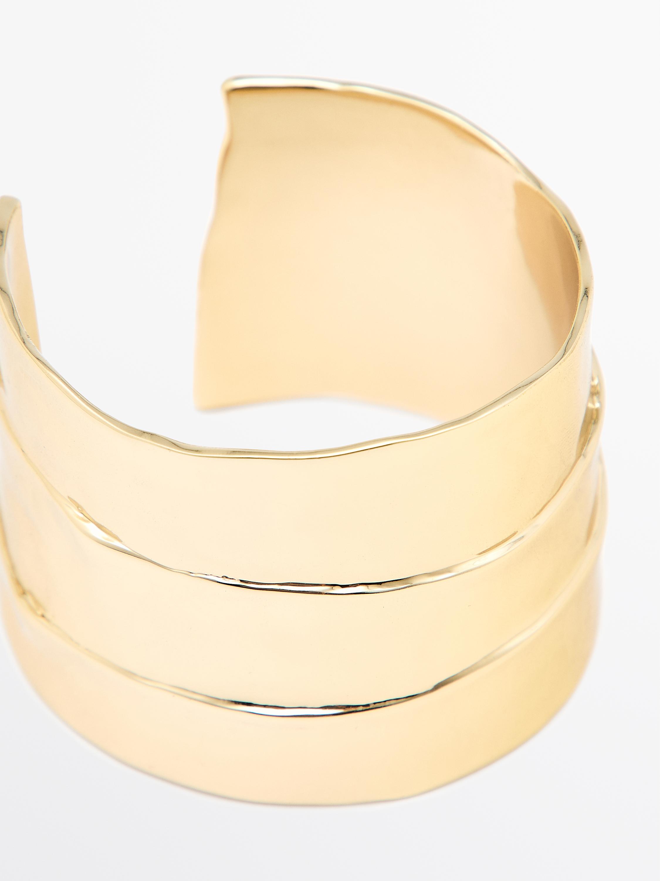 Brazalete metálico pliegue