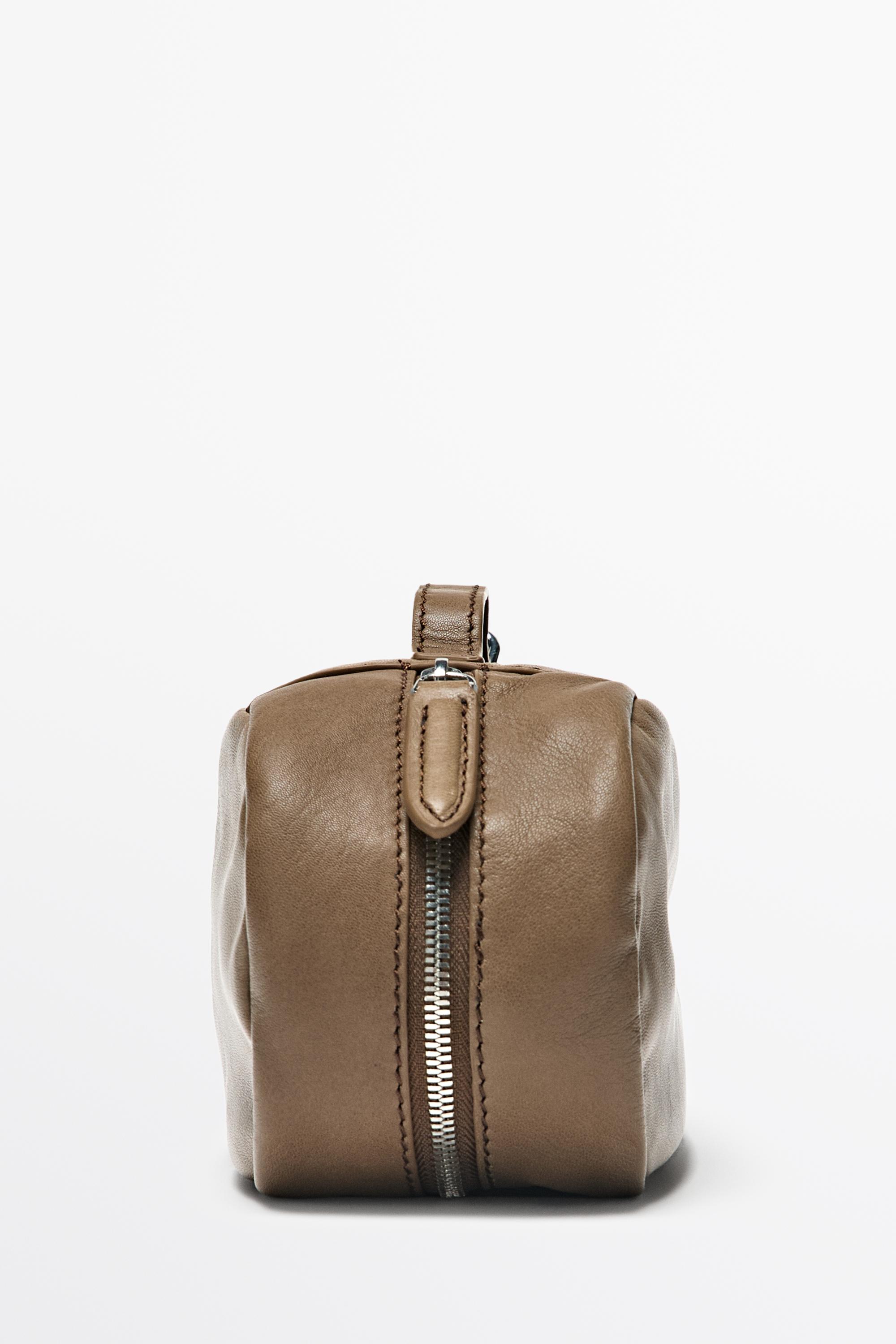 Oval nappa leather toiletry bag