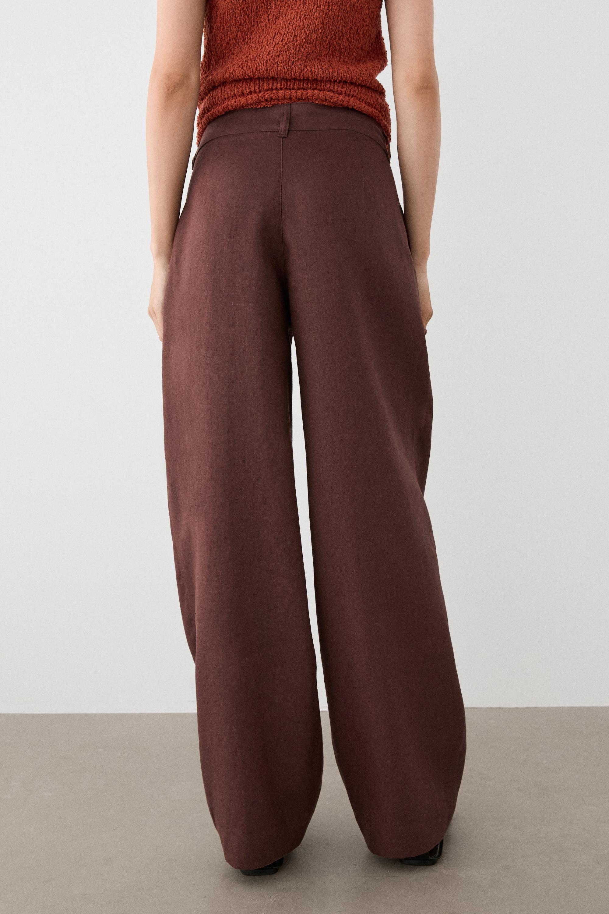 Wide-leg pleated linen trousers — TERRA COTA