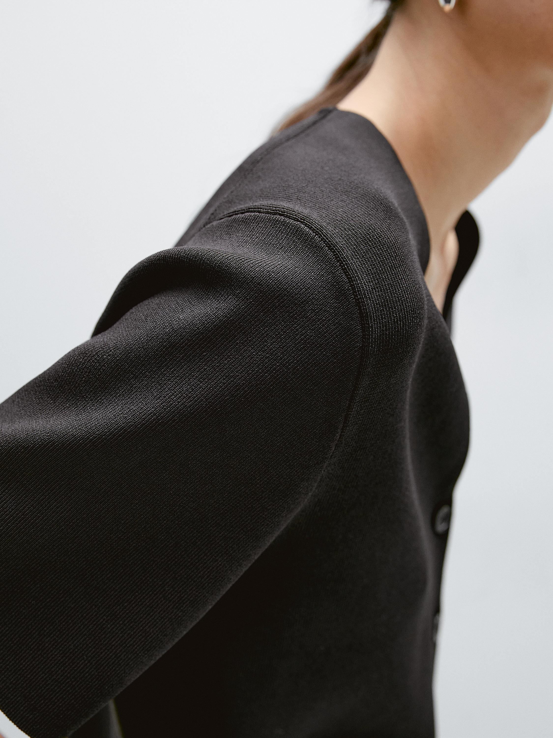 Flowing knit short sleeve cardigan