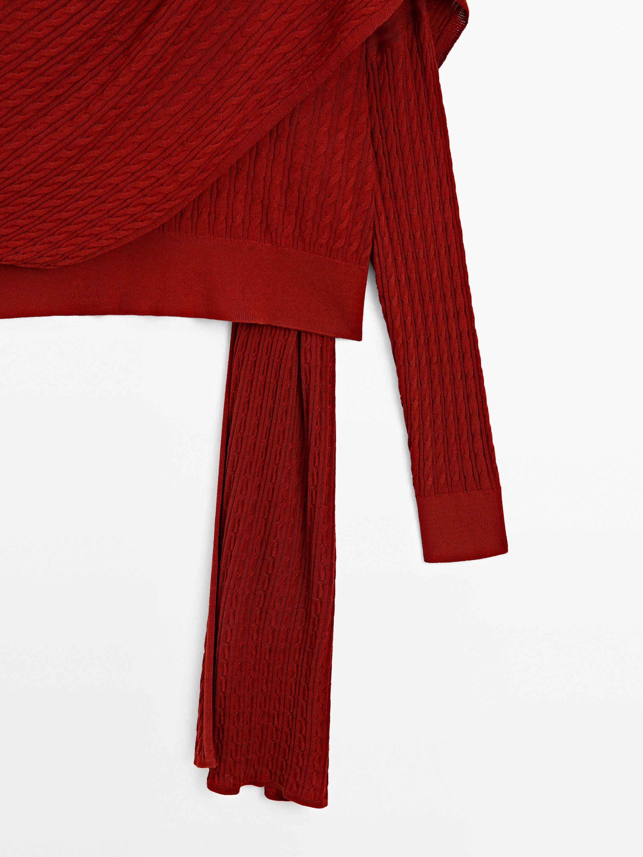 Cable-knit sweater with scarf detail