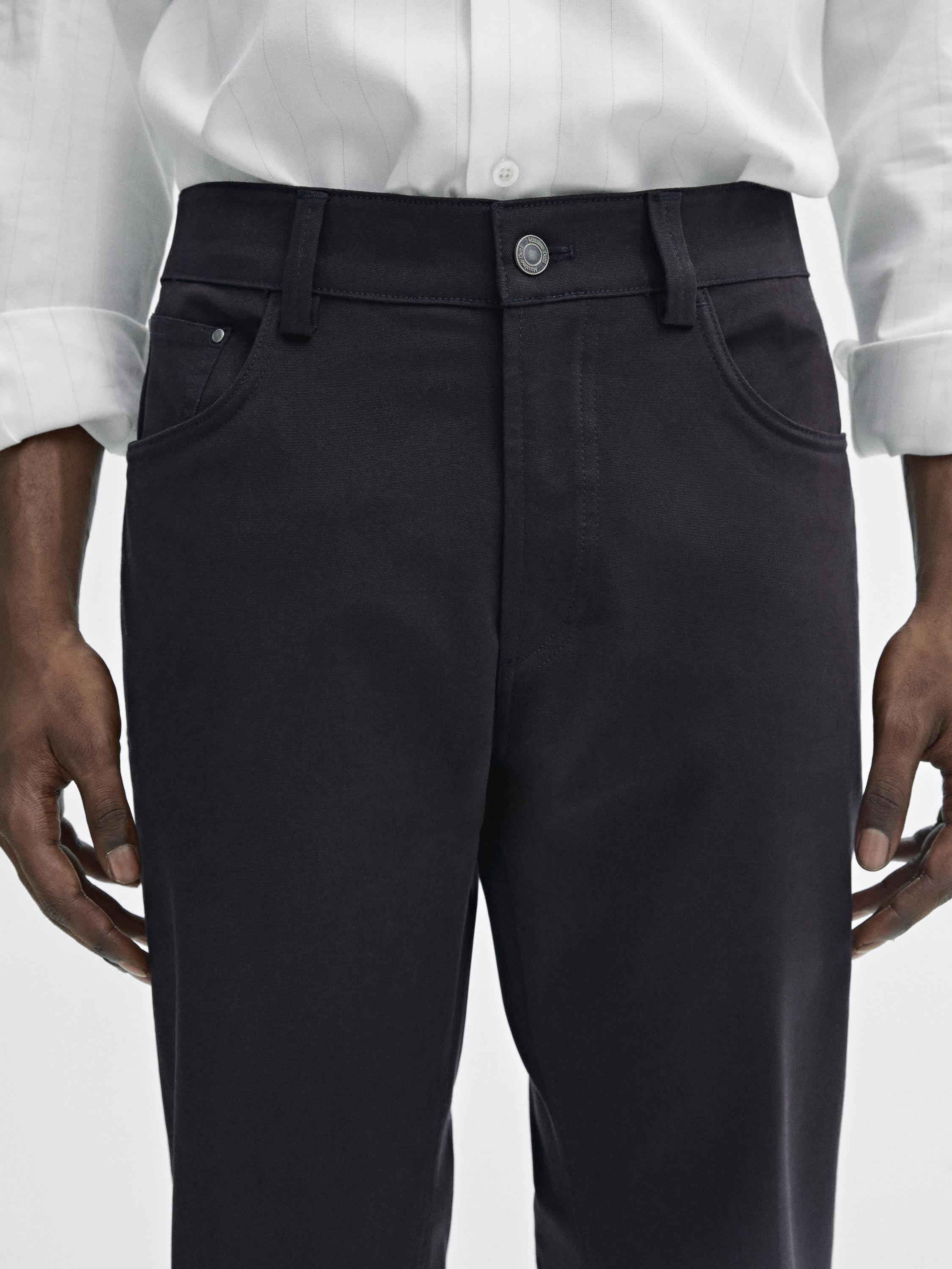 Cotton blend tapered fit jeans