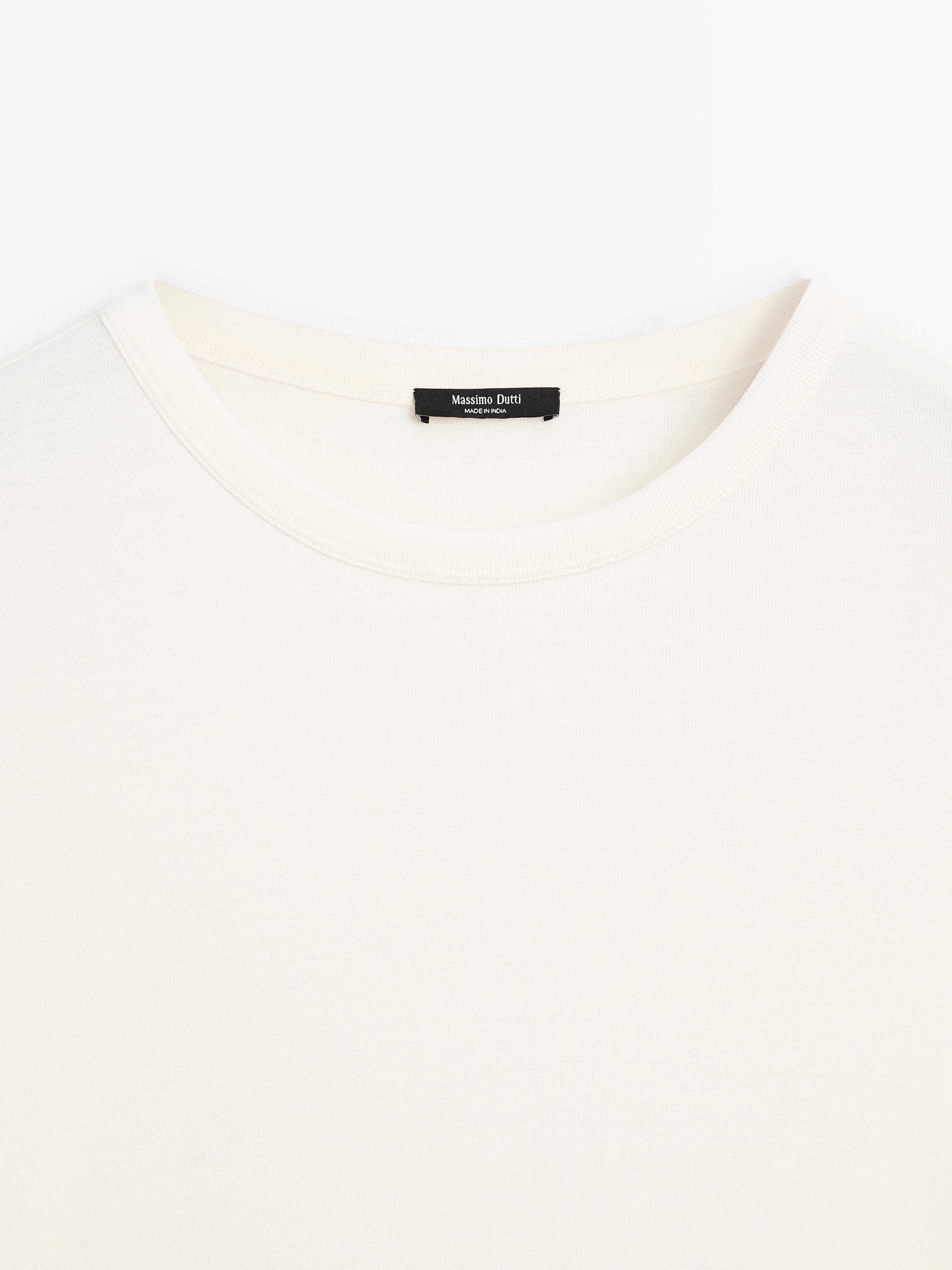 Langarmshirt mit abgerundetem Saum