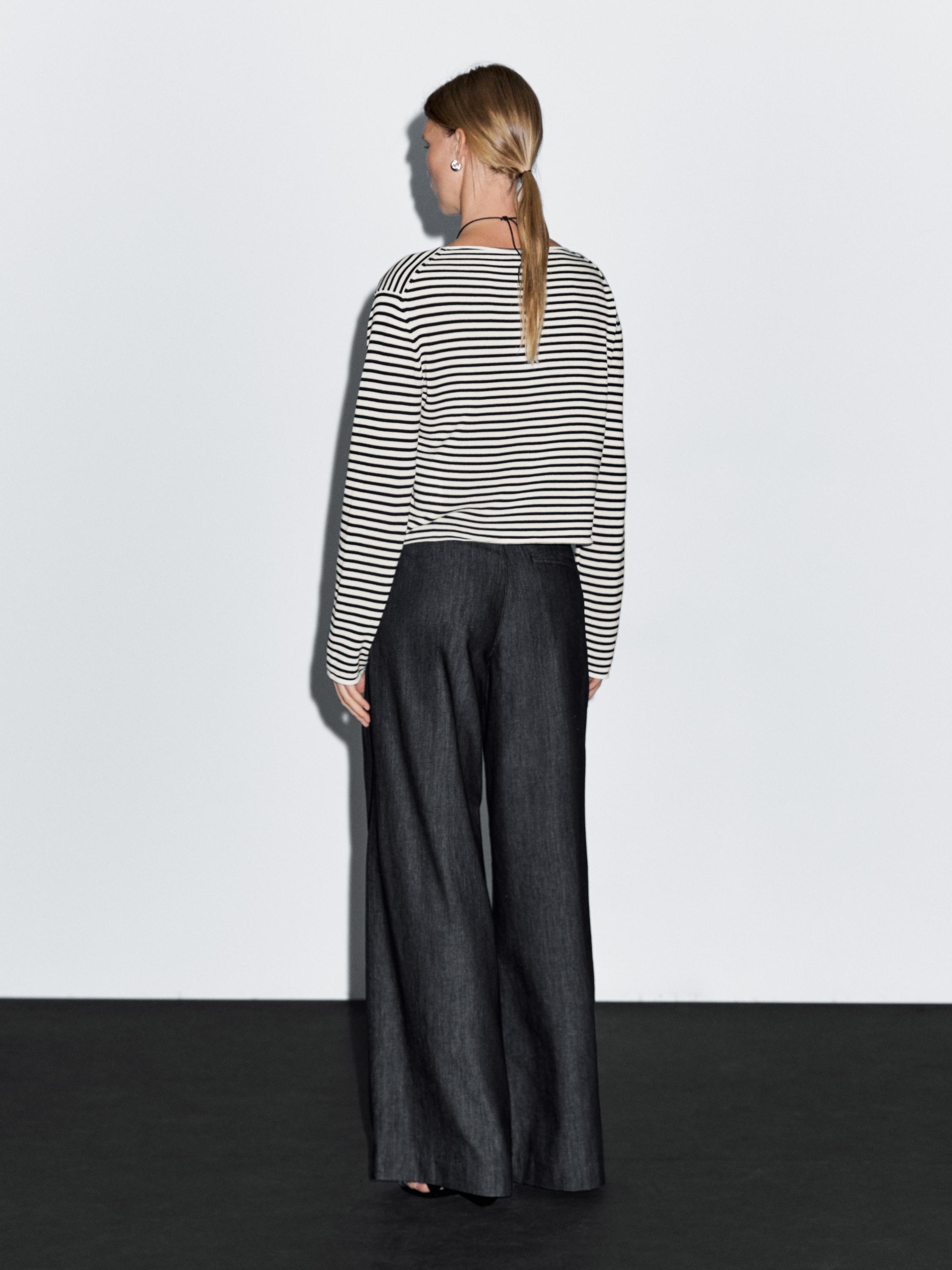 Lekkie jeansy z szerokimi nogawkami i wysokim stanem