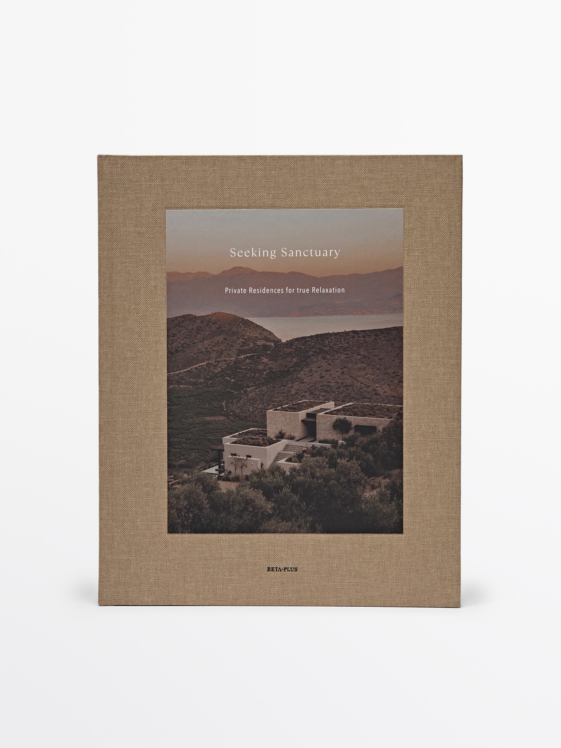 Capa de livro com o texto 'Seeking Sanctuary' e 'Private Residences for true Relaxation' sobre paisagem.
