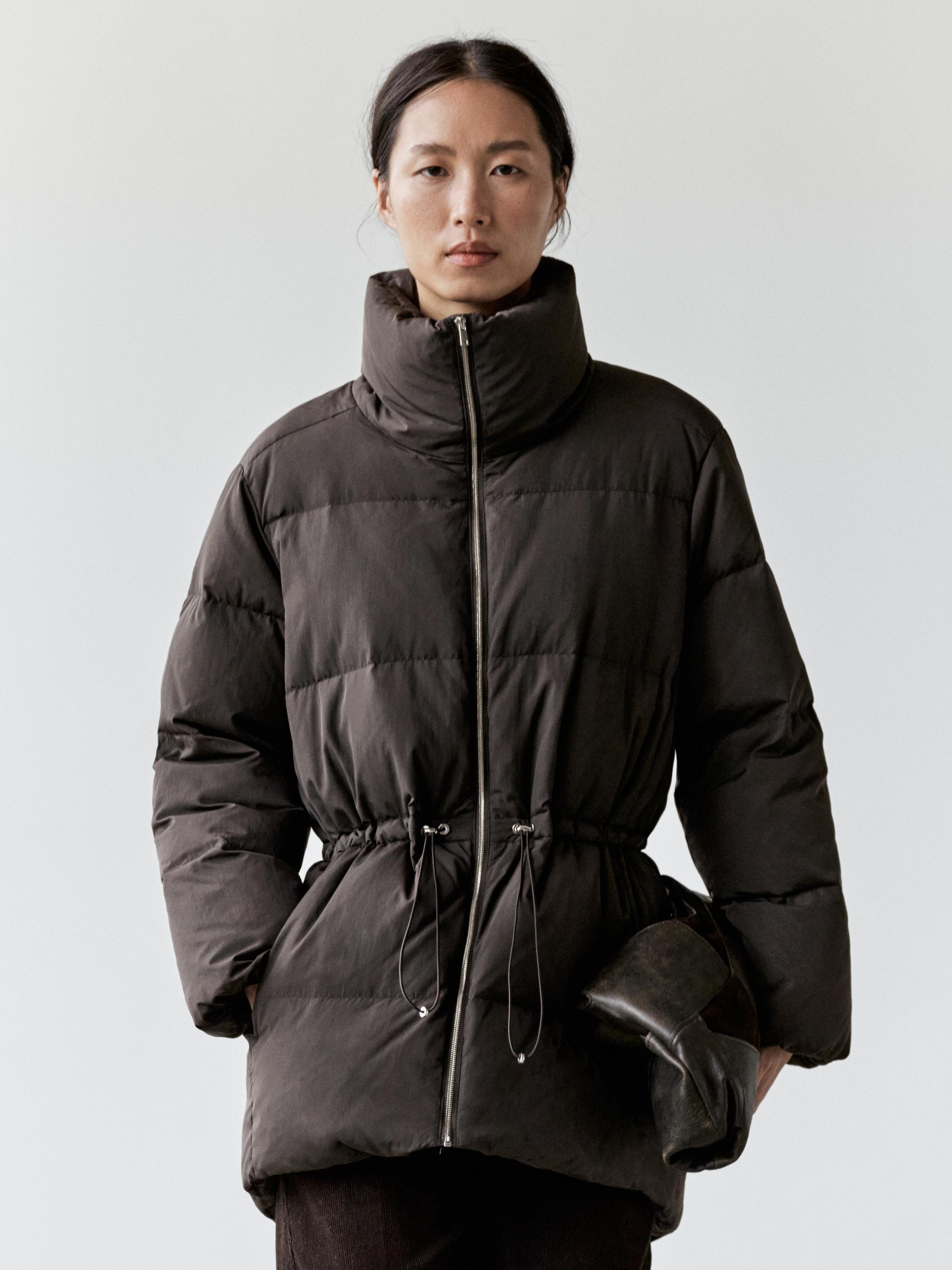 Xhaketë kundër ujit me bel elastik