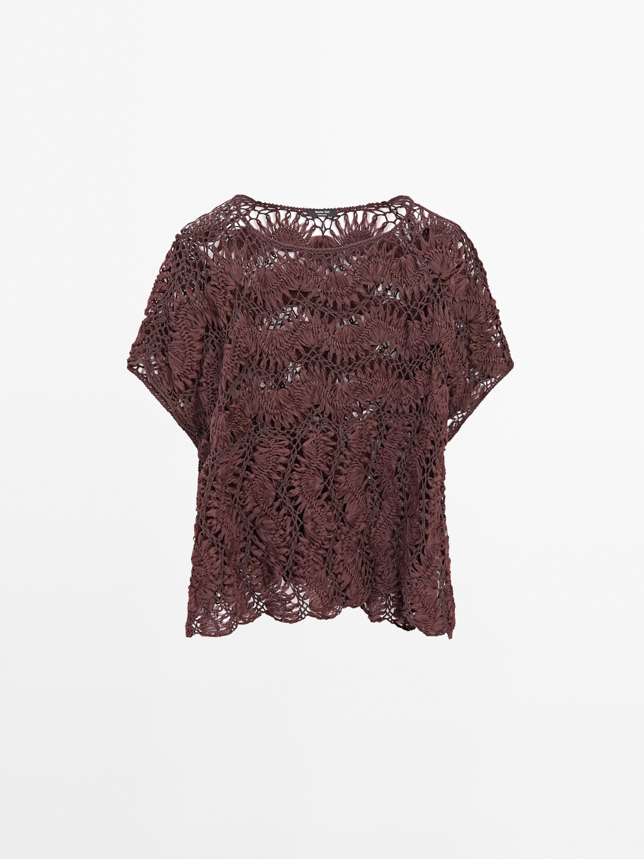 Cape en maille ajourée crochetée