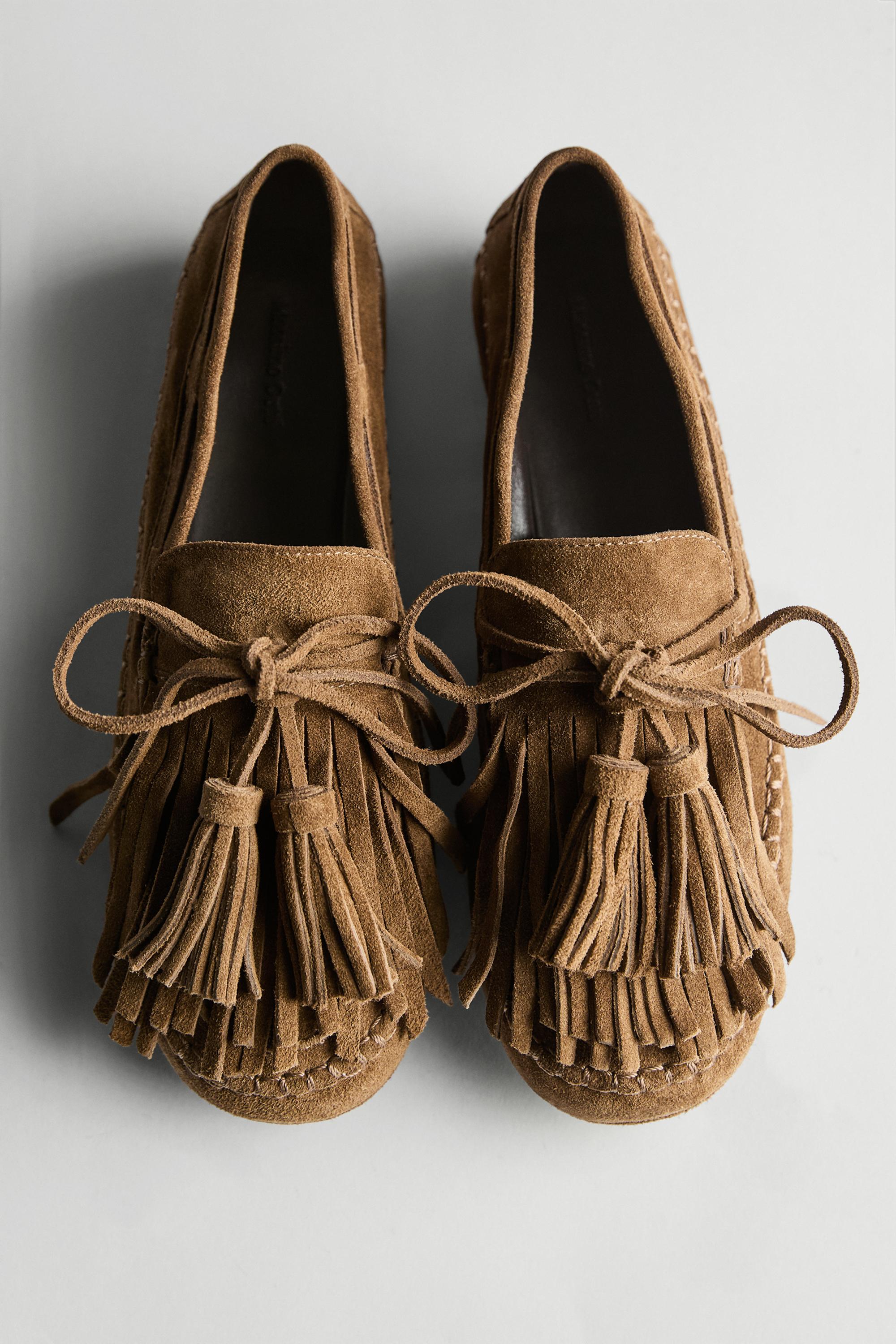 Split suede loafers with fringing and tassels — TAN
