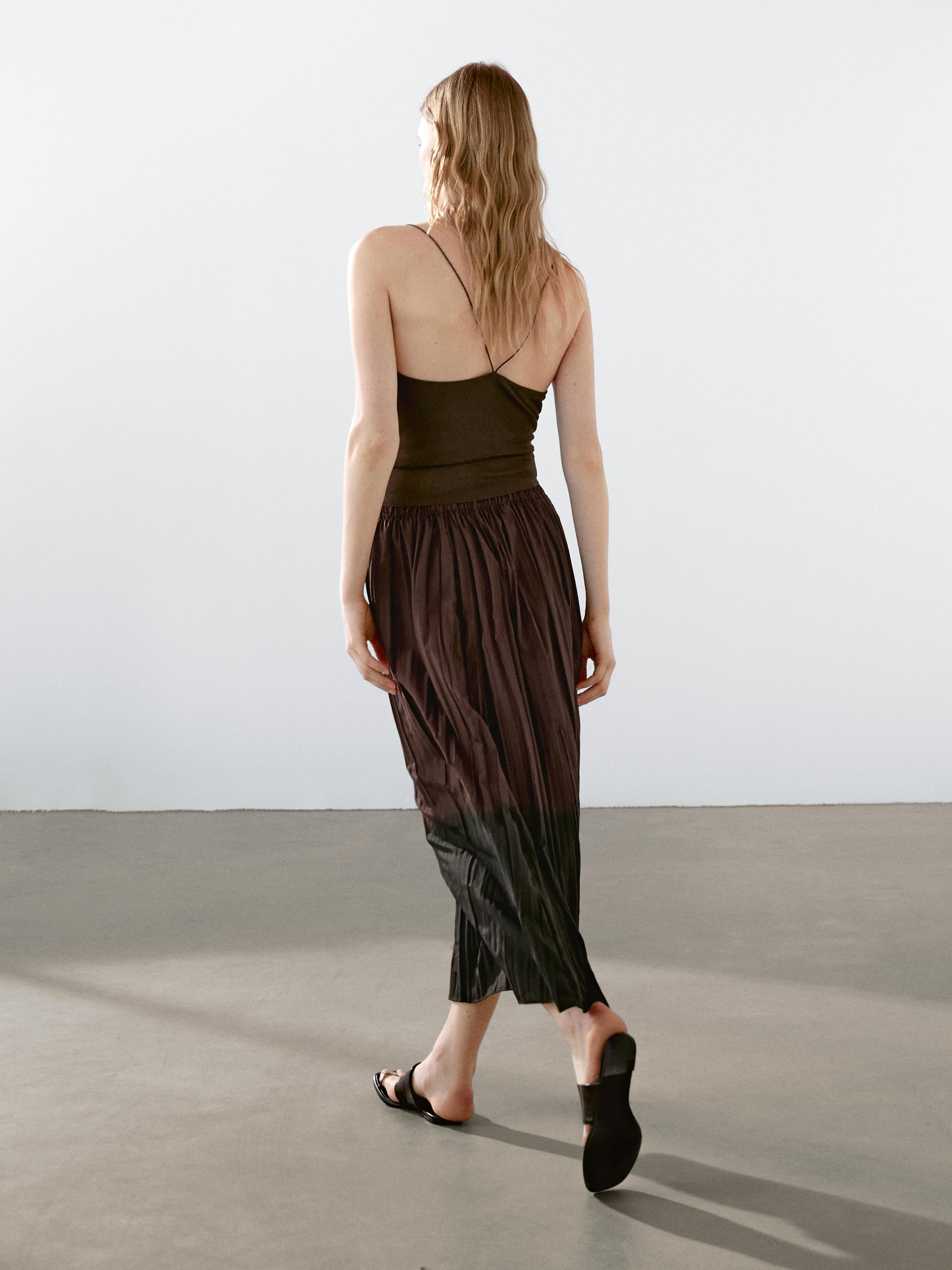 Long flowing pleated skirt