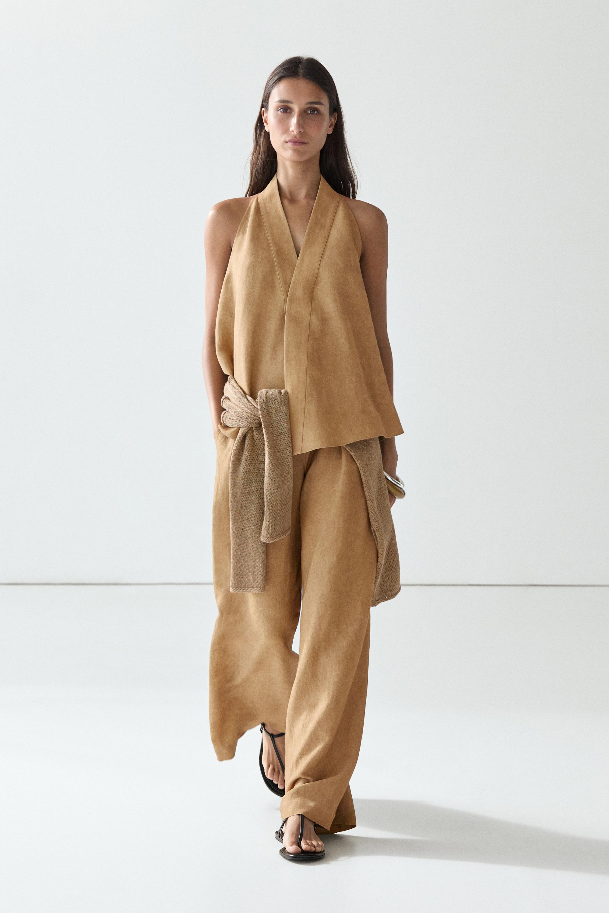 Wide-leg pleated linen blend trousers