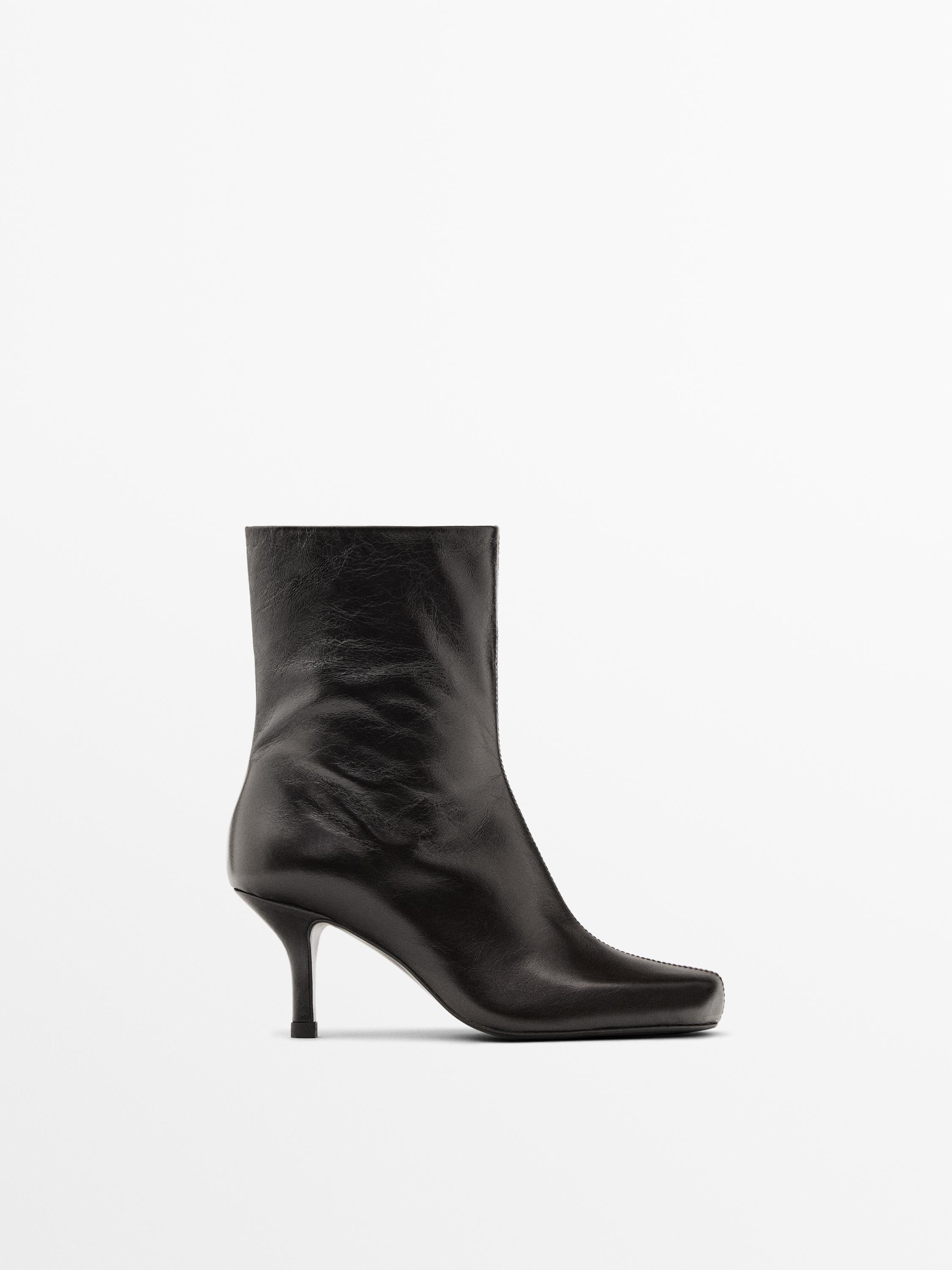 Bottines à talon en cuir brillant