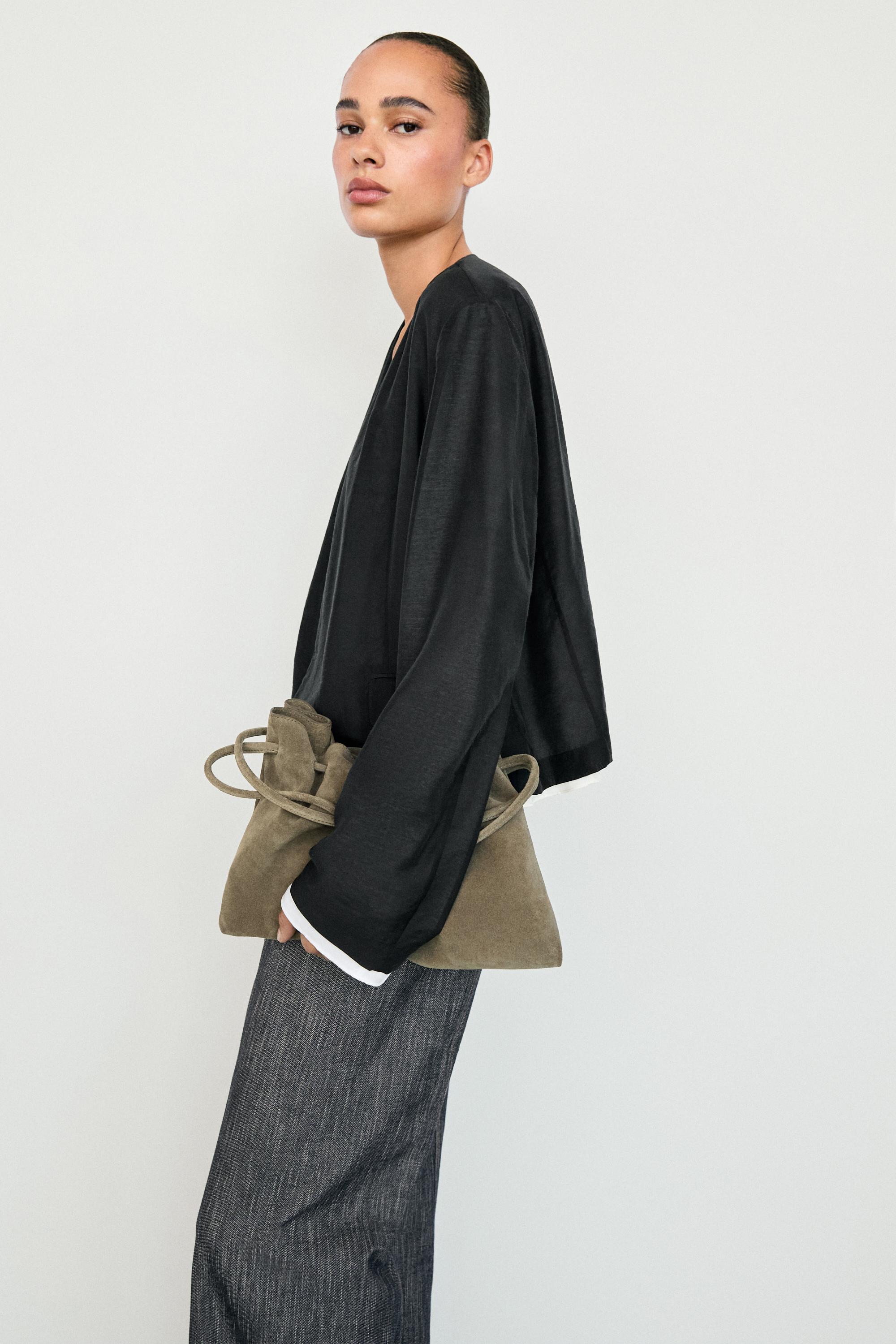 Contrast double jacket for a complete look — BLACK