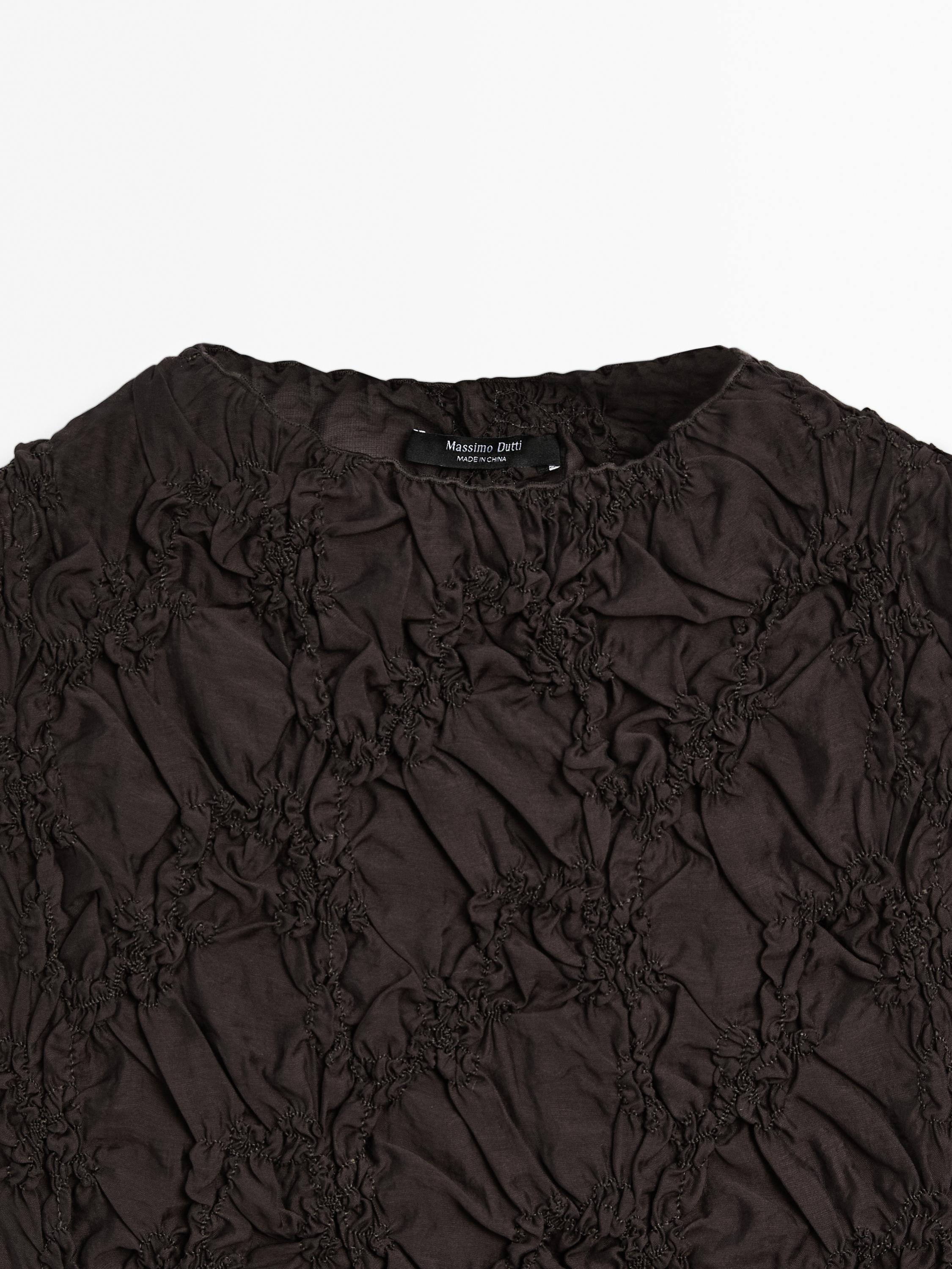 Creased-effect funnel neck top