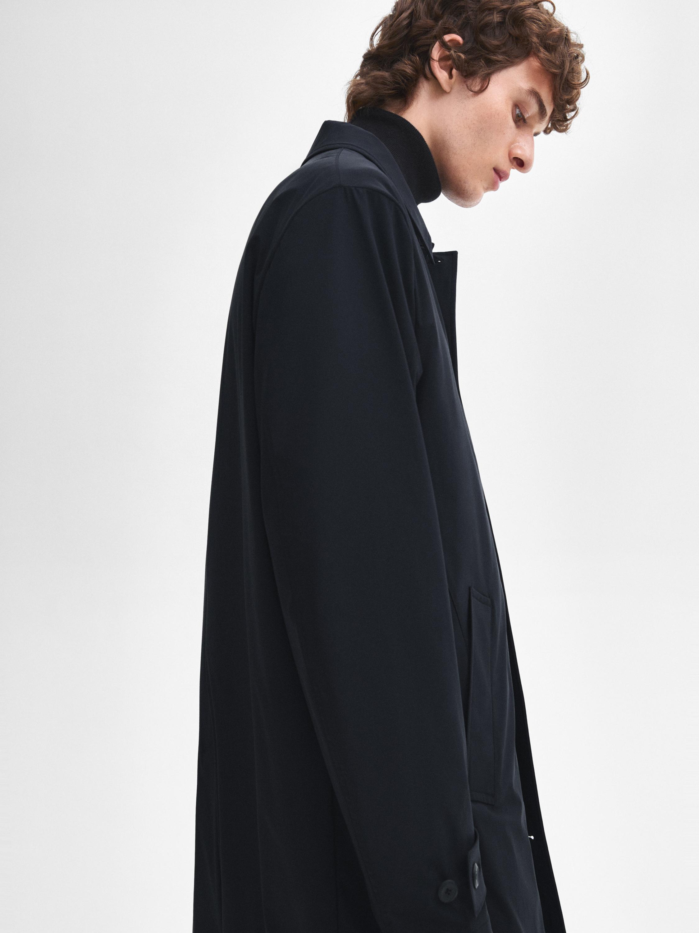 Trench smart avec lanière aux poignets