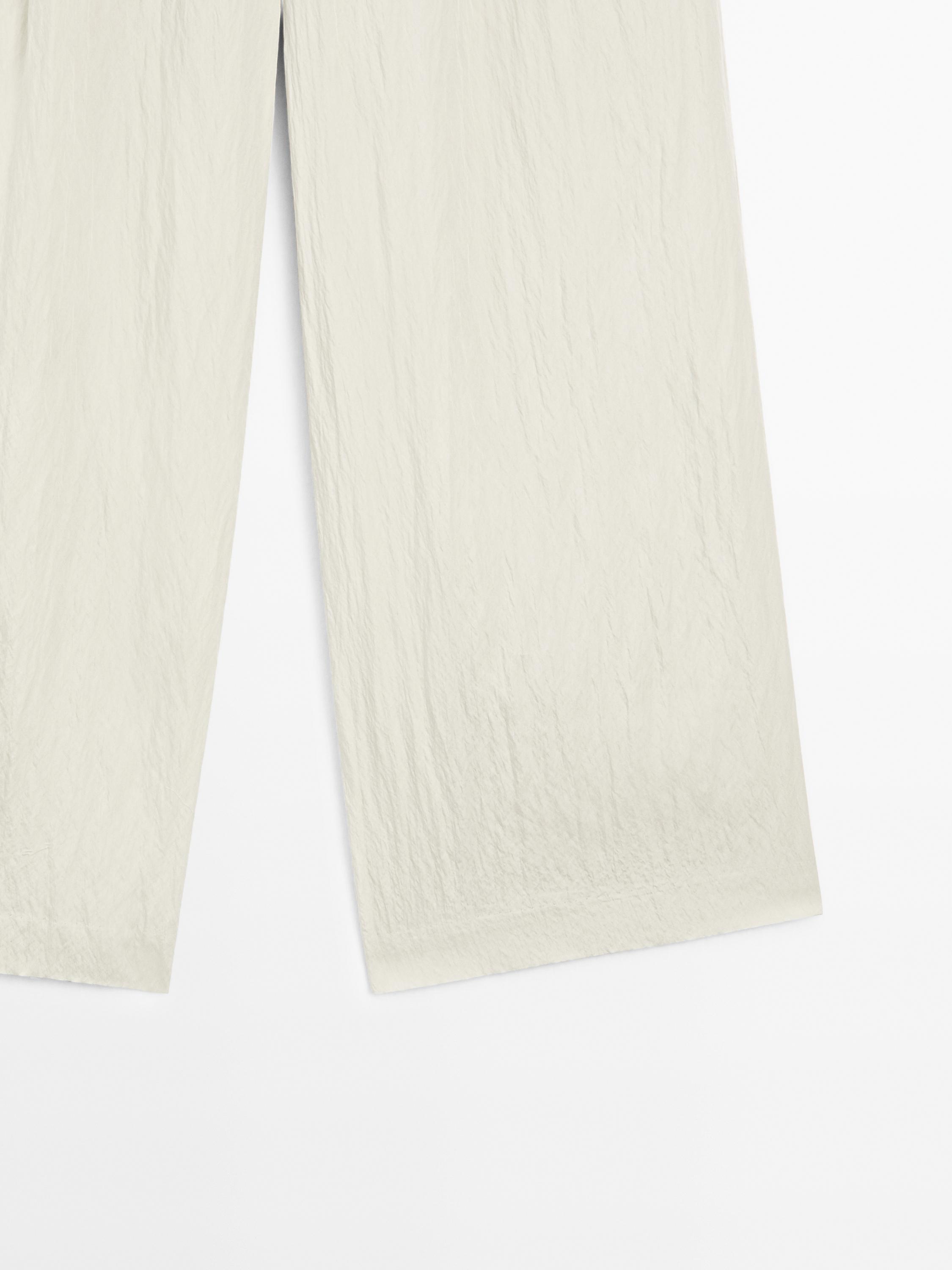 Technical trousers with darts