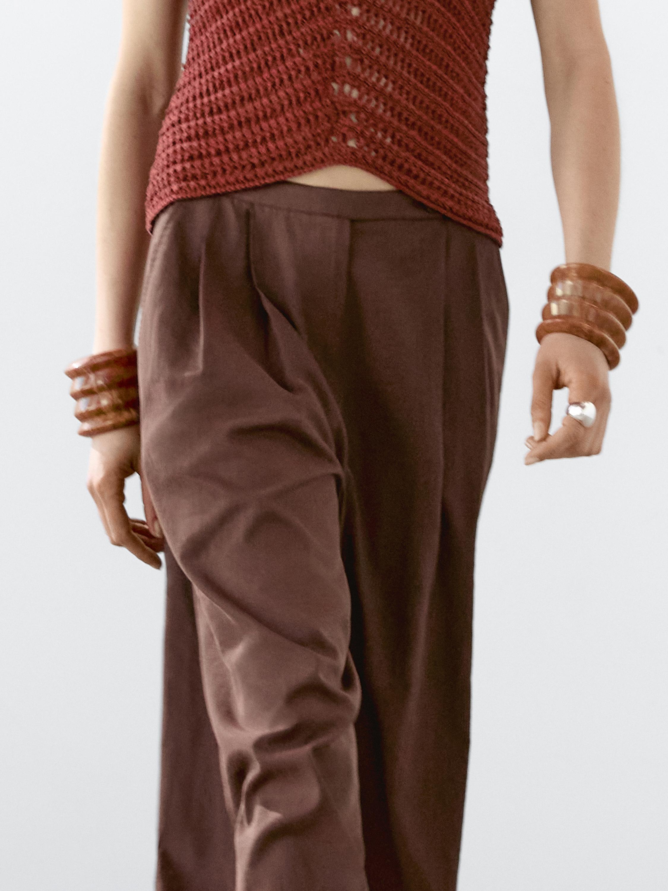 Flowing trousers with double darts