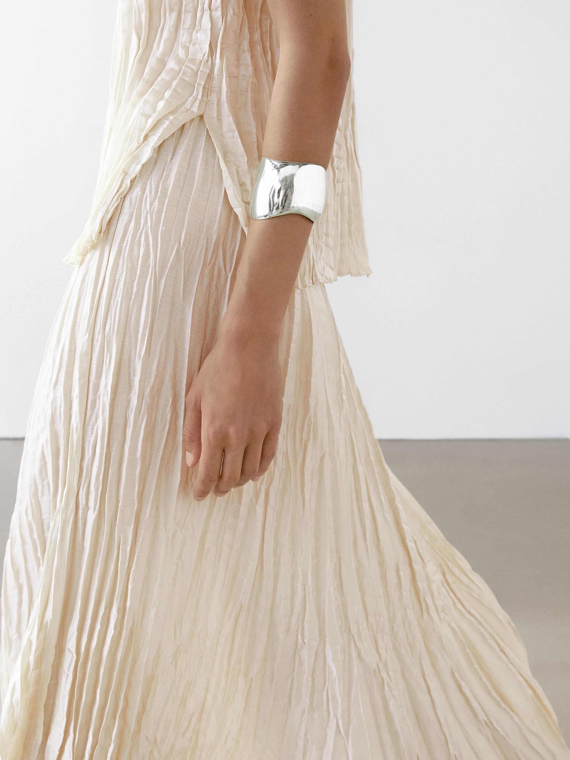 Flowing pleated midi skirt