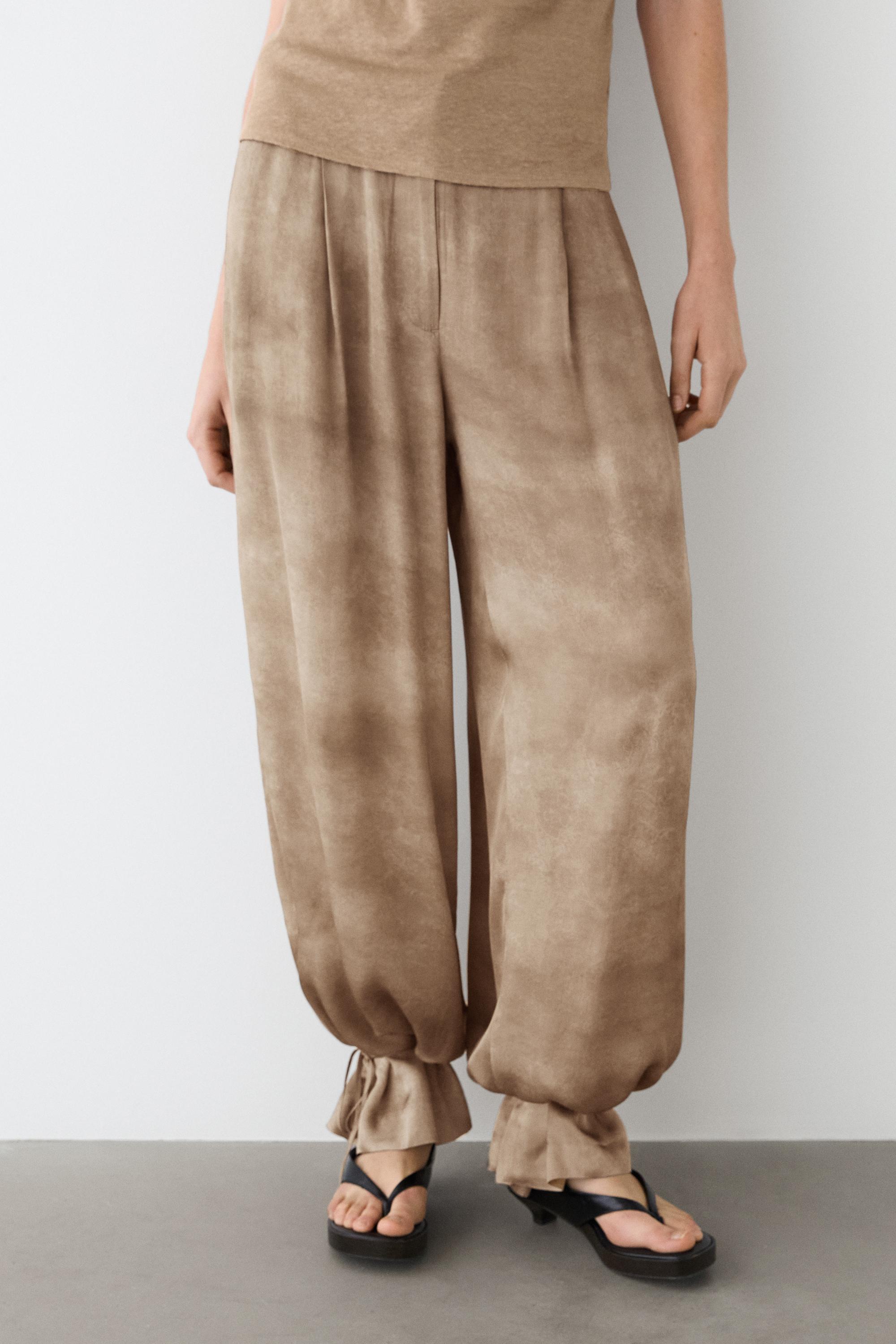 Flowing pants with tie-detail hem — BEIGE