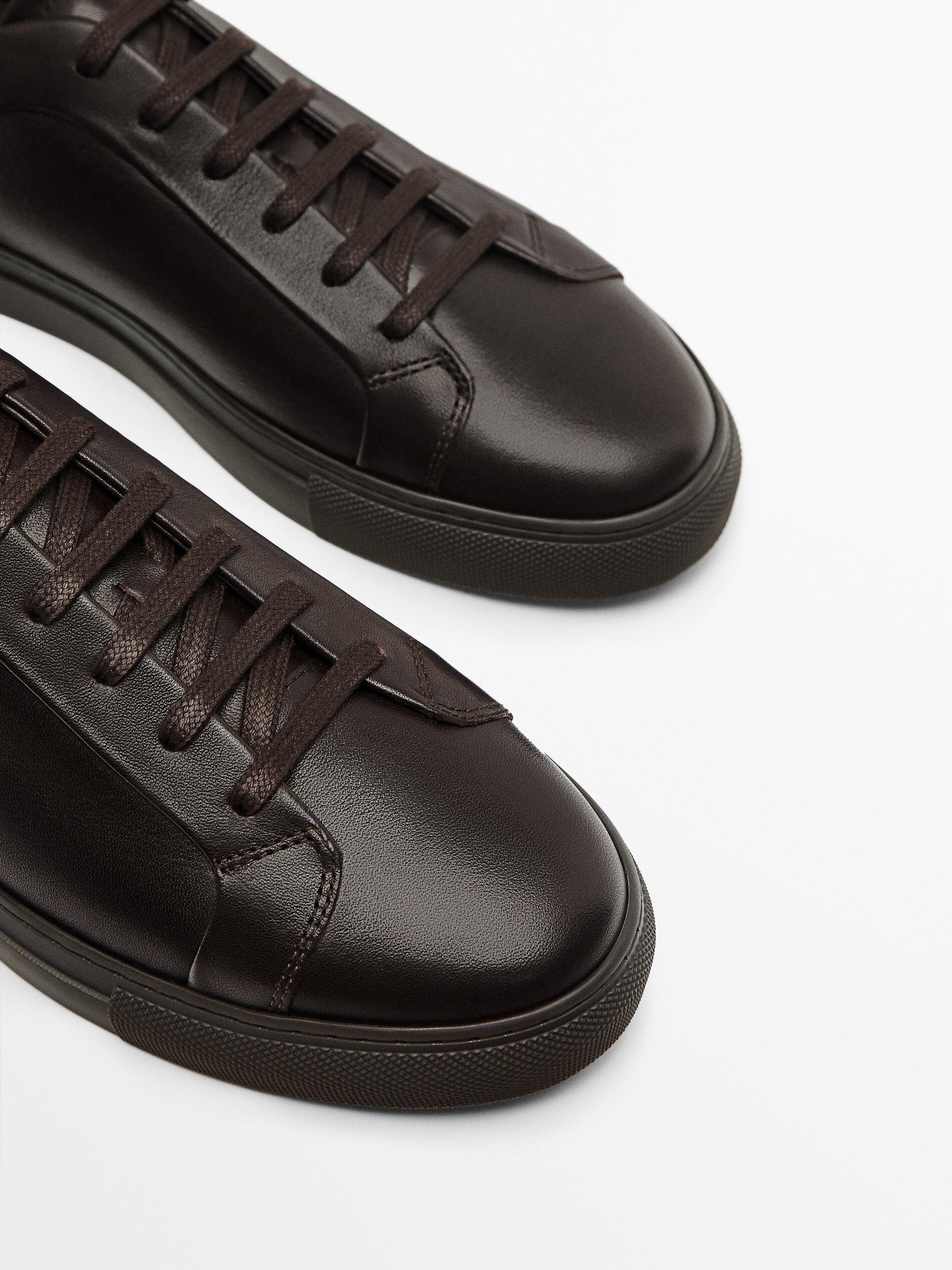 Dark brown leather trainers