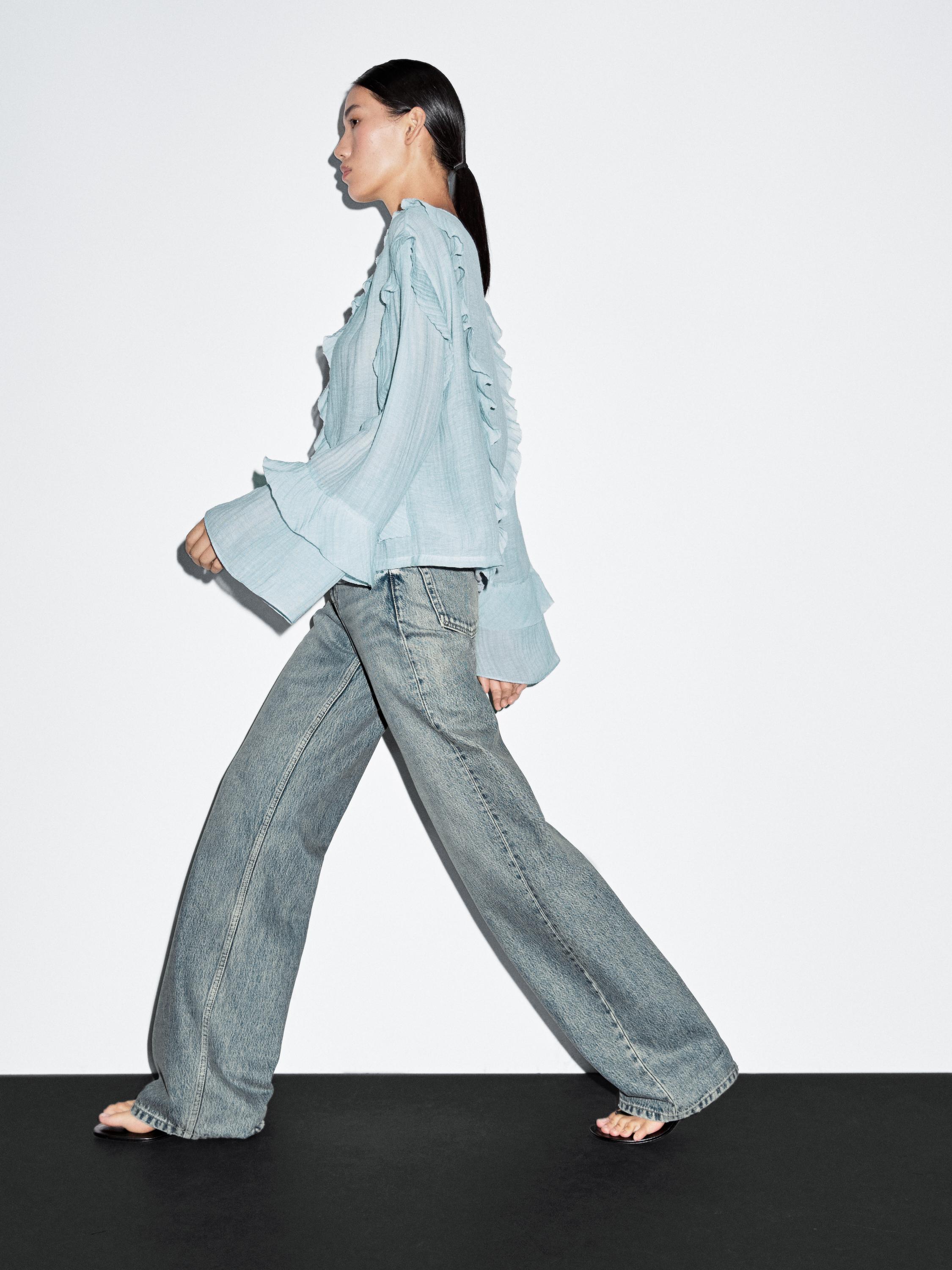 Flowing blouse with ruffles