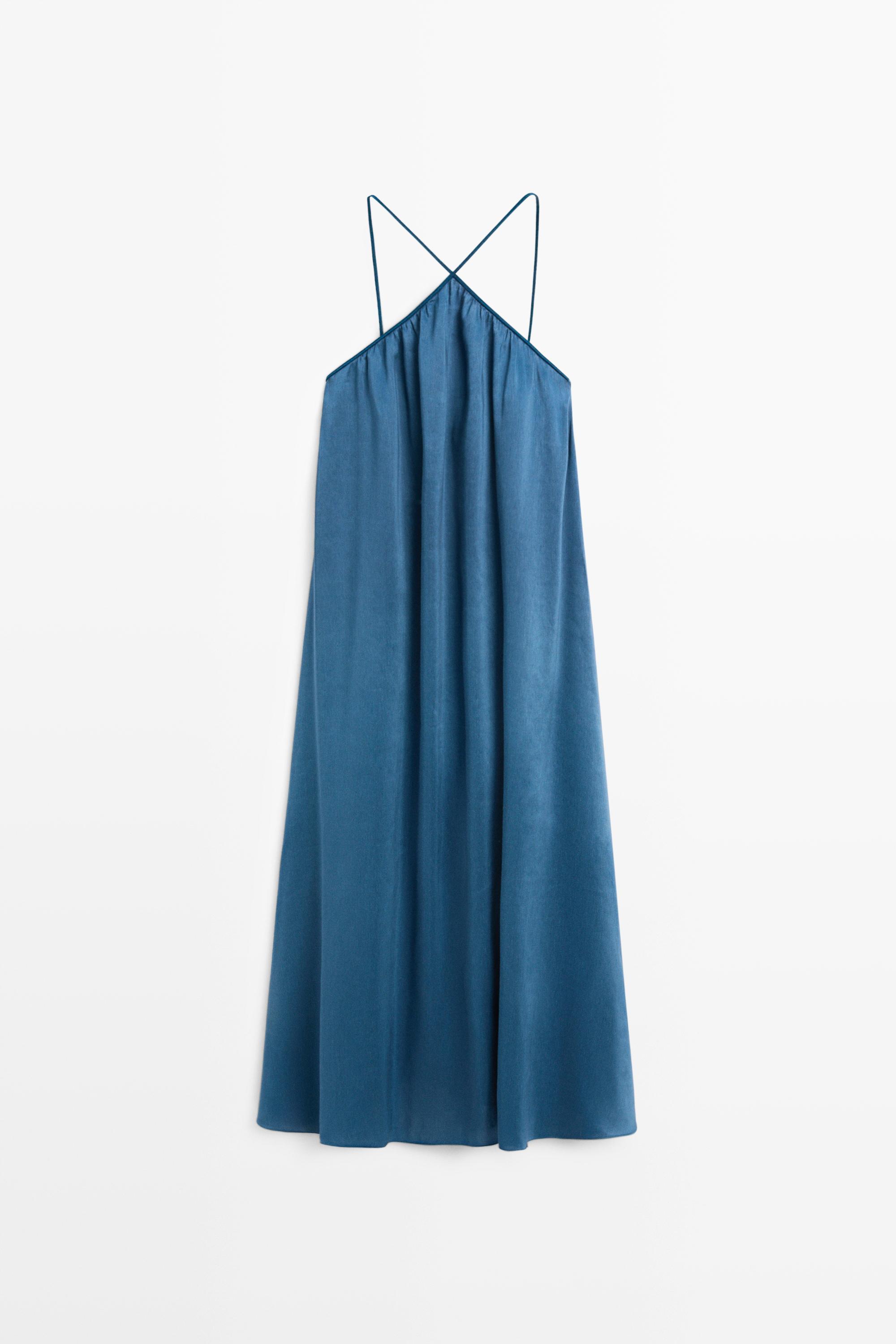 Long flowing dress with criss-cross straps