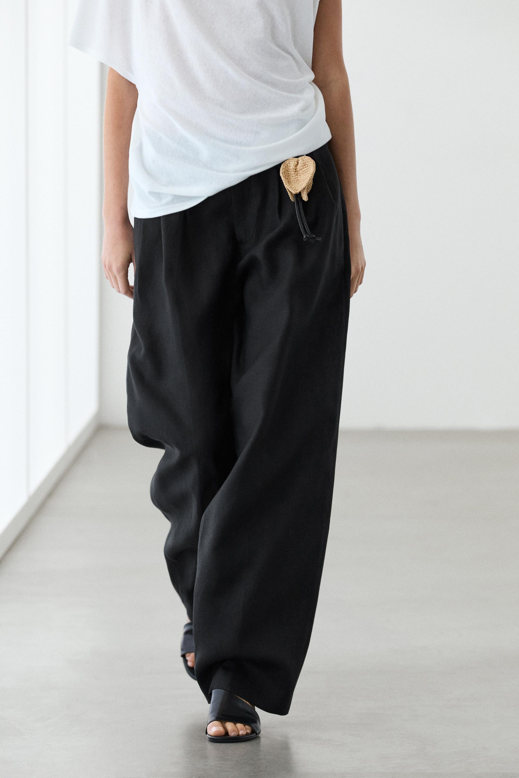 Wide-leg pleated linen trousers — BLACK
