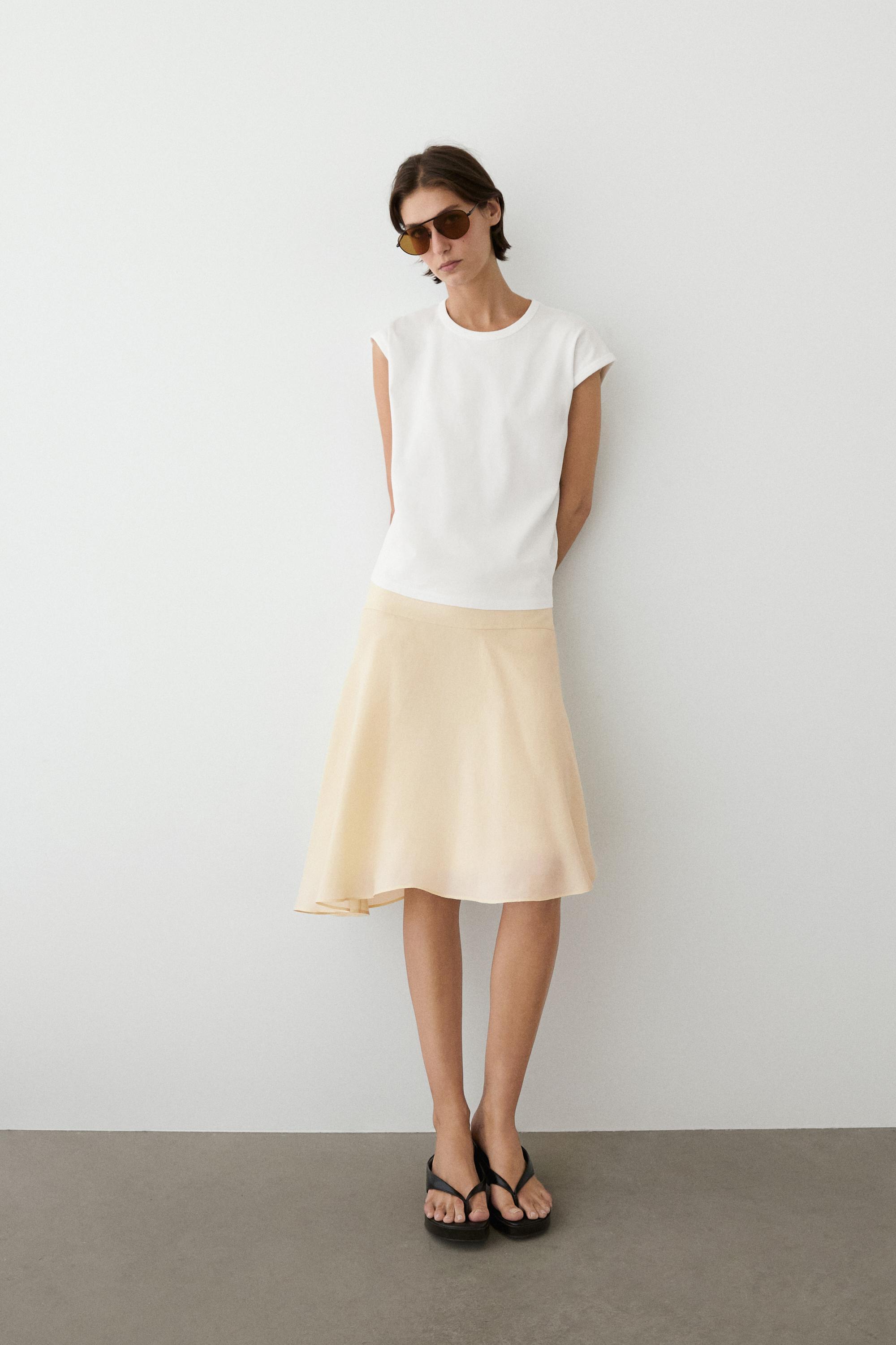 Flowing asymmetric midi skirt — Gold
